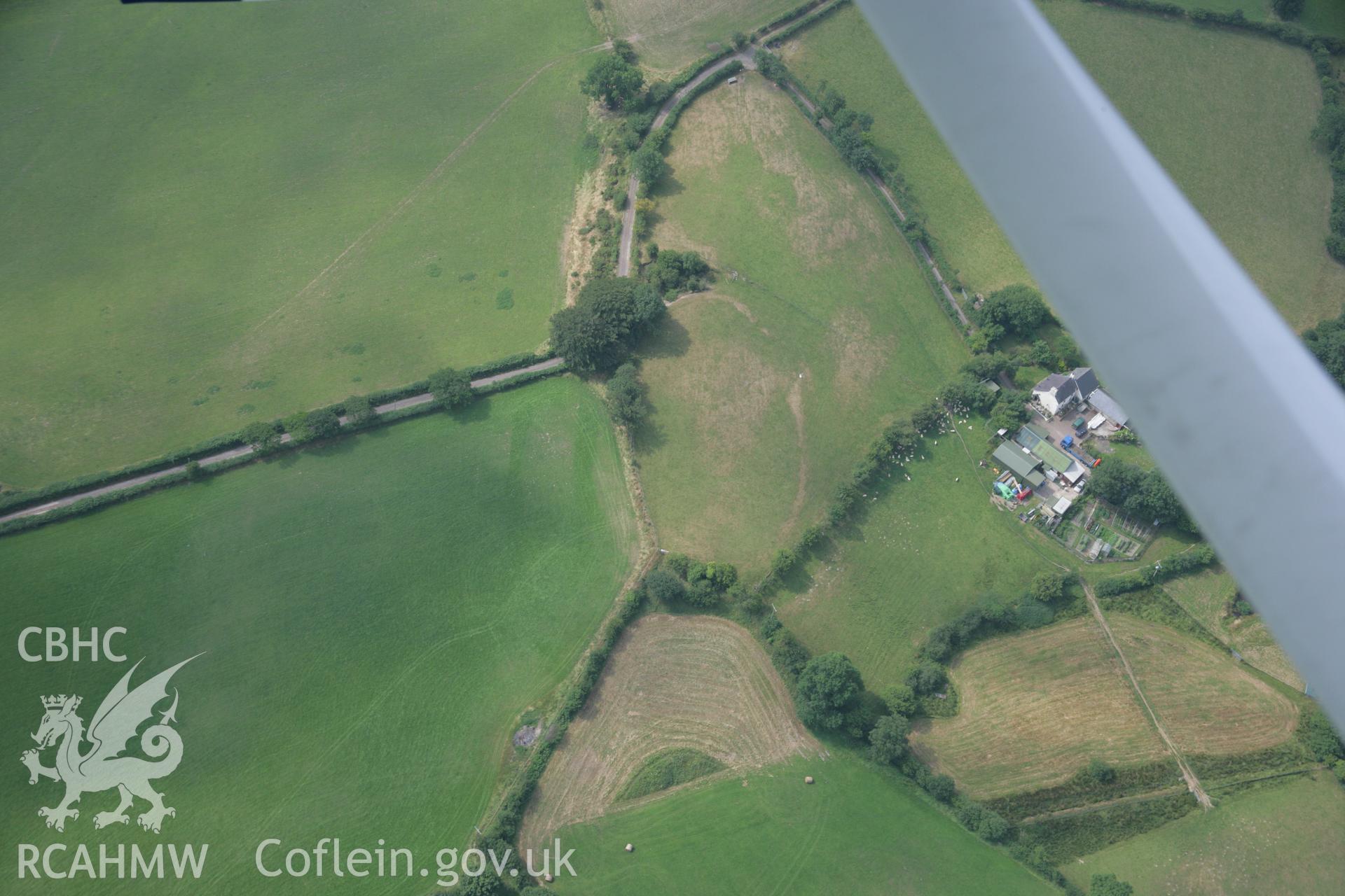 RCAHMW colour oblique aerial photograph of Pen-y-Gaer, Deri-Odwyn. Taken on 21 July 2006 by Toby Driver.