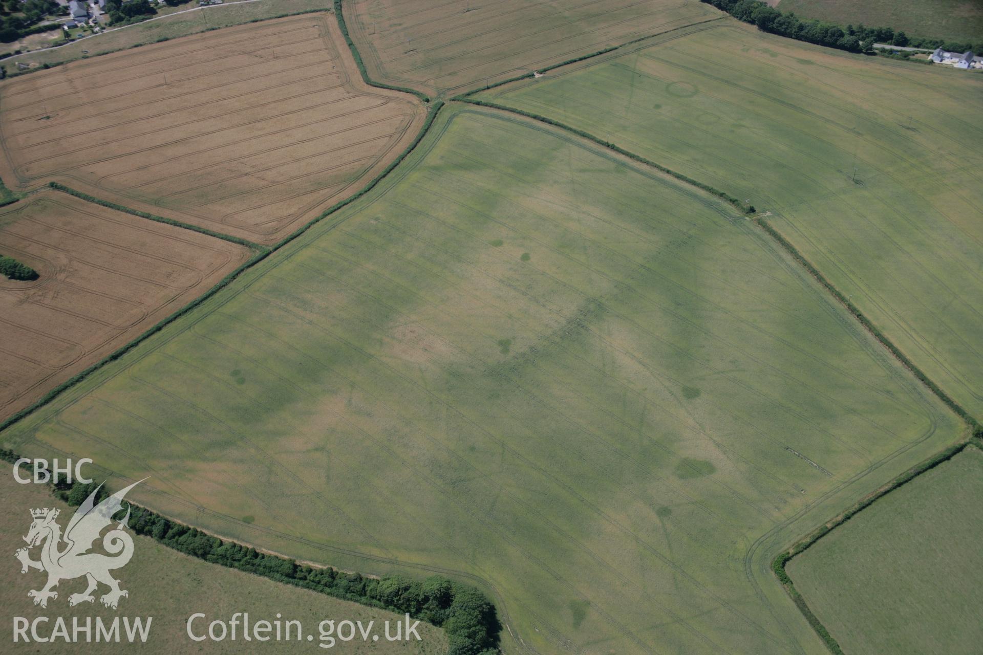RCAHMW colour oblique aerial photograph of St Donat's Deserted Village. Taken on 24 July 2006 by Toby Driver.