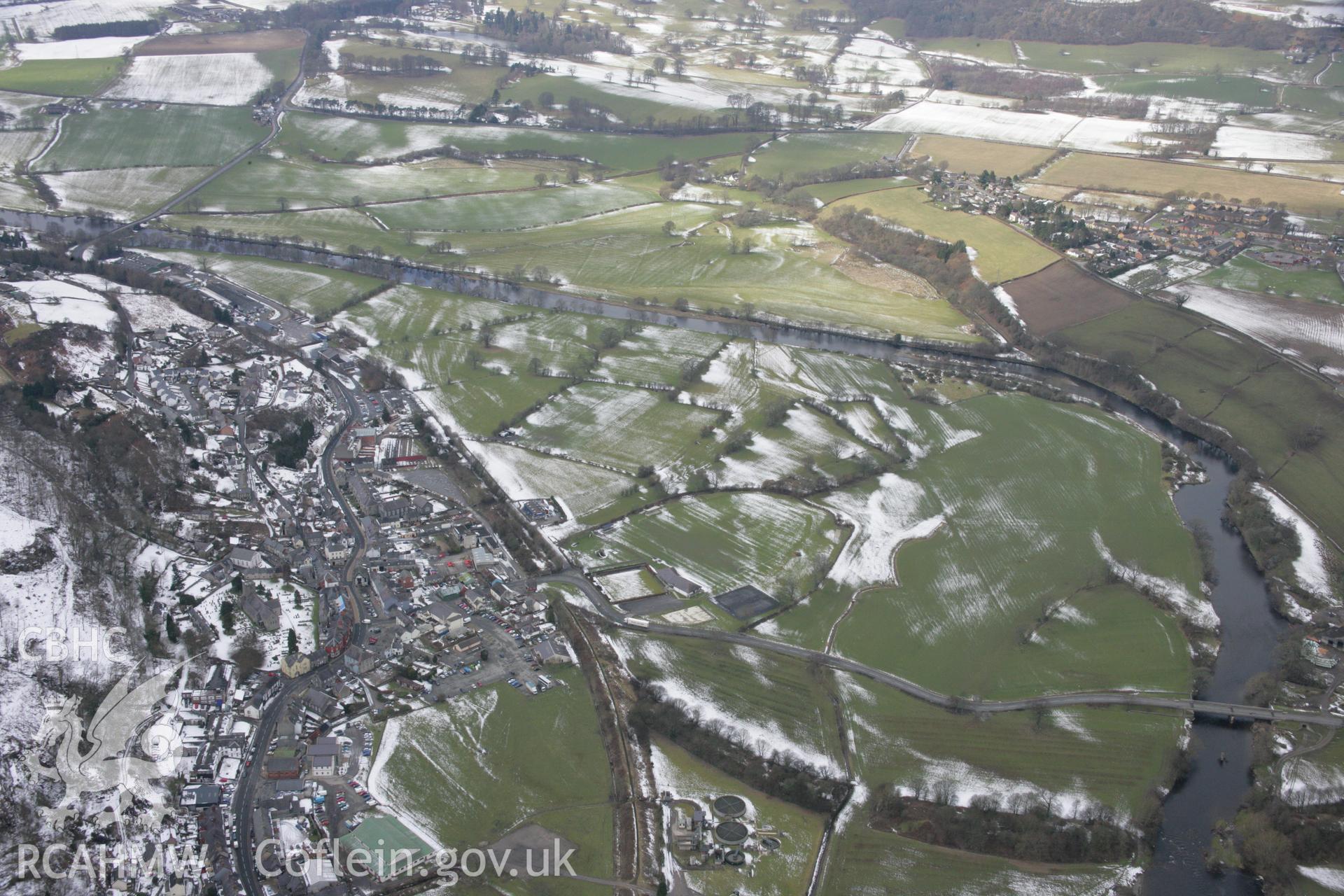 RCAHMW colour oblique aerial photograph of Corwen from the east with melting snow in the fields. Taken on 06 March 2006 by Toby Driver.
