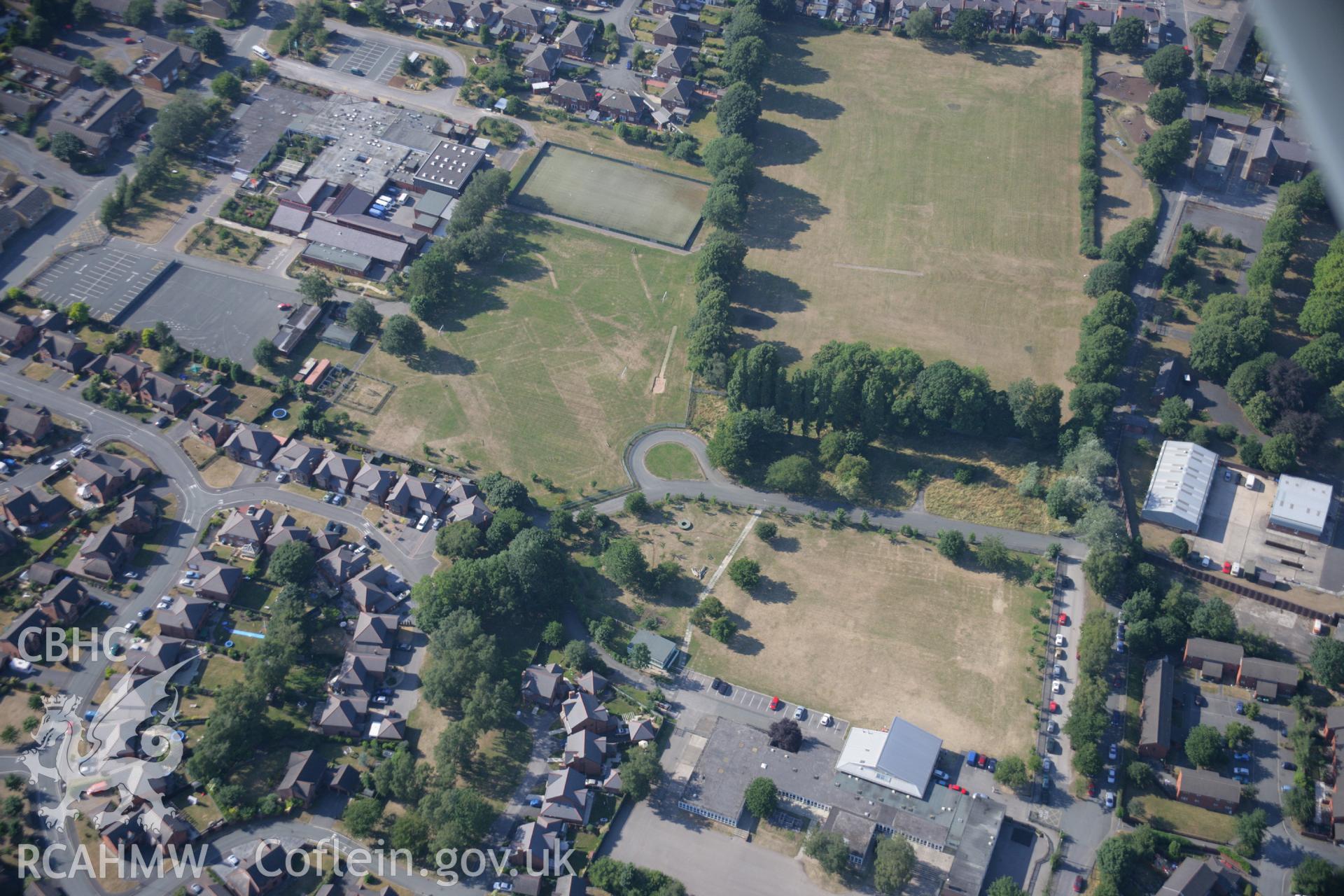 RCAHMW colour oblique aerial photograph of cropmarks of Former Barracks at Hightown. Taken on 17 July 2006 by Toby Driver.