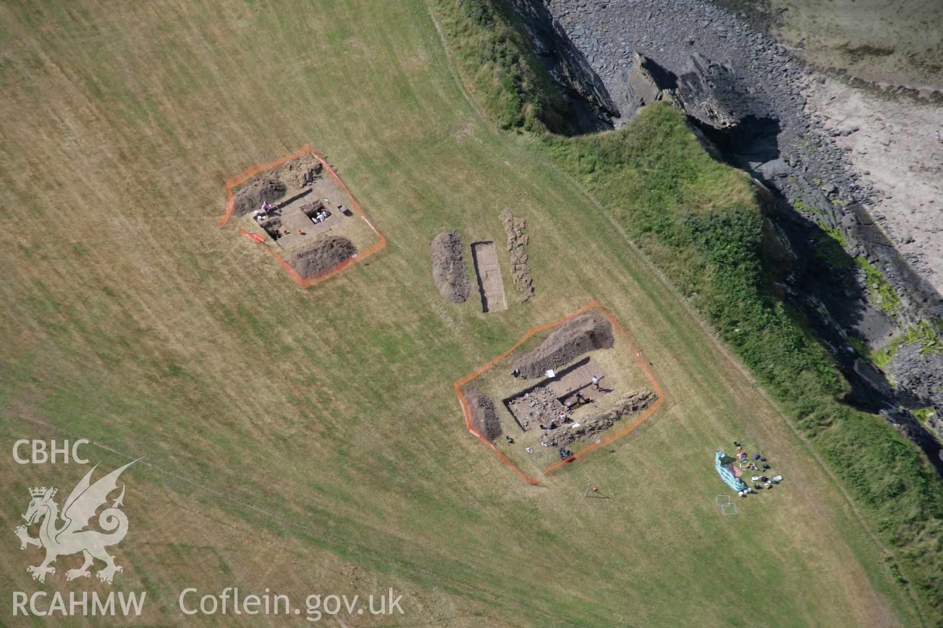 RCAHMW colour oblique aerial photograph of West Angle Bay Cemetery and Enclosure showing excavations. Taken on 24 July 2006 by Toby Driver.