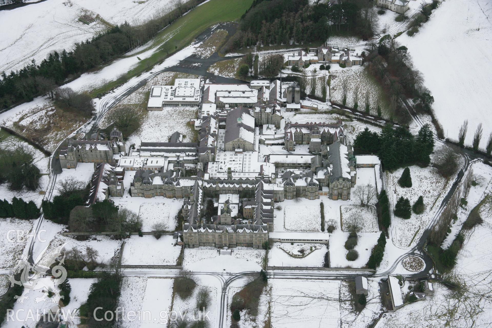 RCAHMW colour oblique aerial photograph of North Wales Counties Mental Hospital Complex, viewed from the north-east. Taken on 06 March 2006 by Toby Driver.