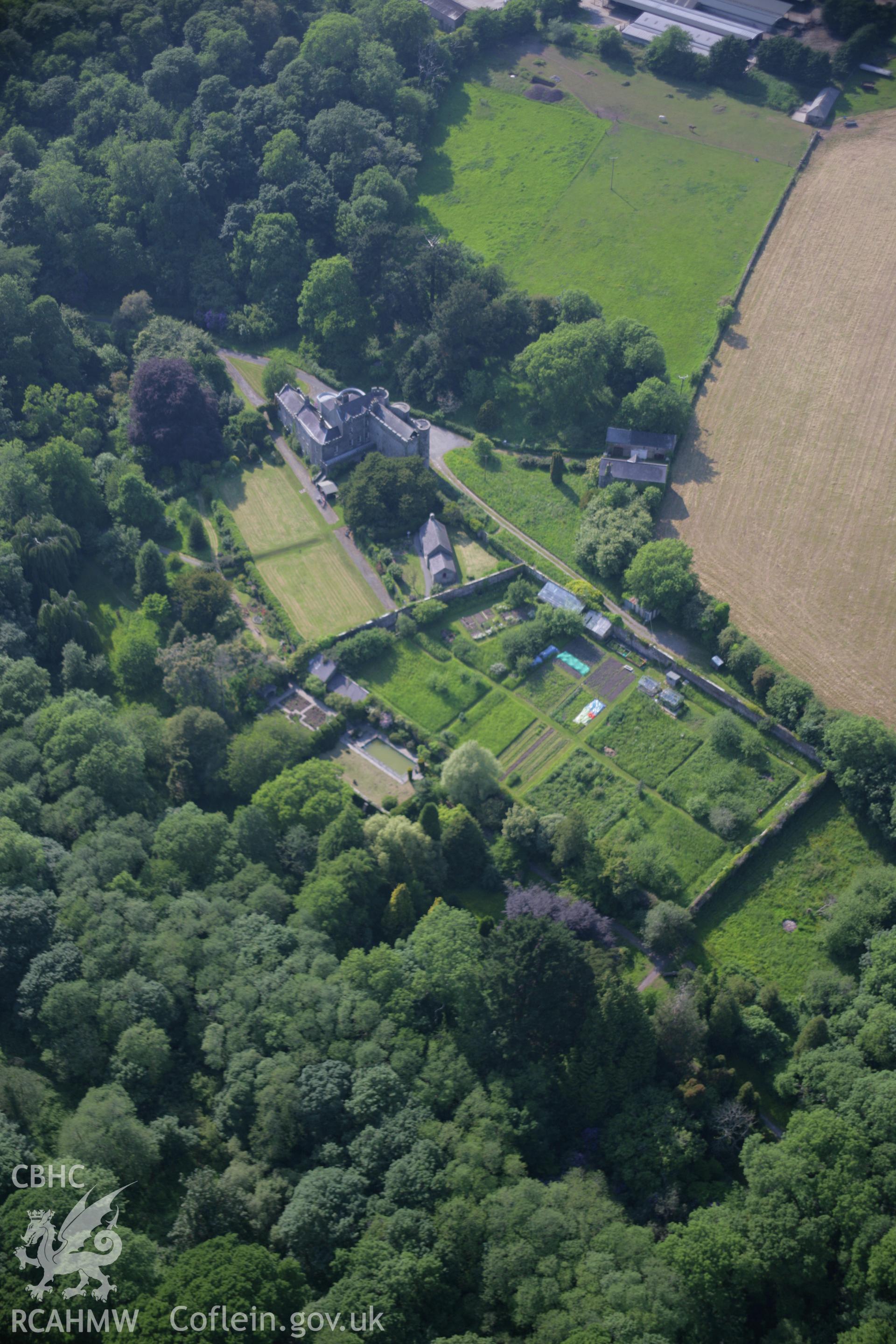 RCAHMW colour oblique aerial photograph of Upton Castle Garden, Cosheston, from the east. Taken on 08 June 2006 by Toby Driver.