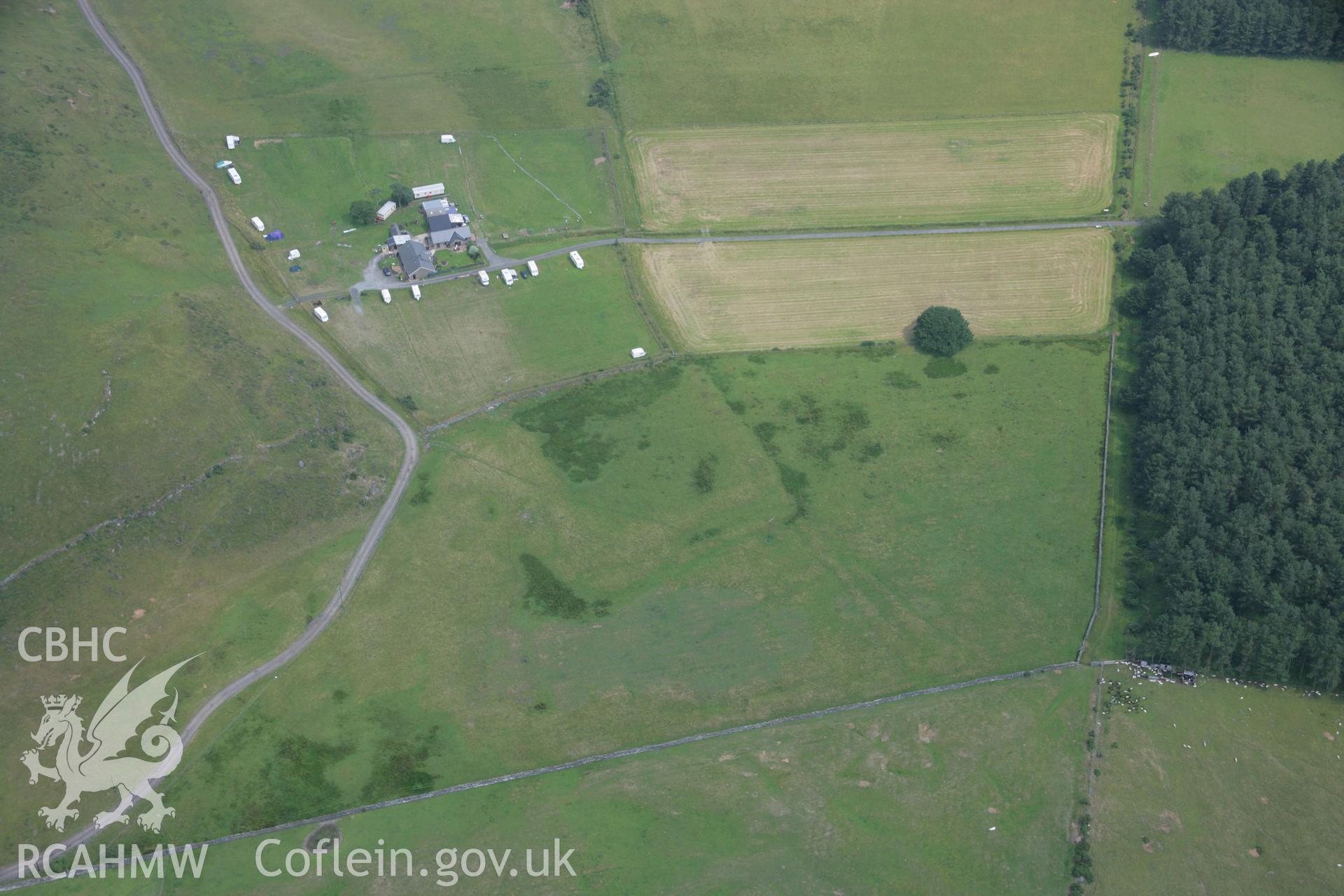 RCAHMW colour oblique aerial photograph of Tanforhesgan Enclosure. Taken on 04 July 2006 by Toby Driver.