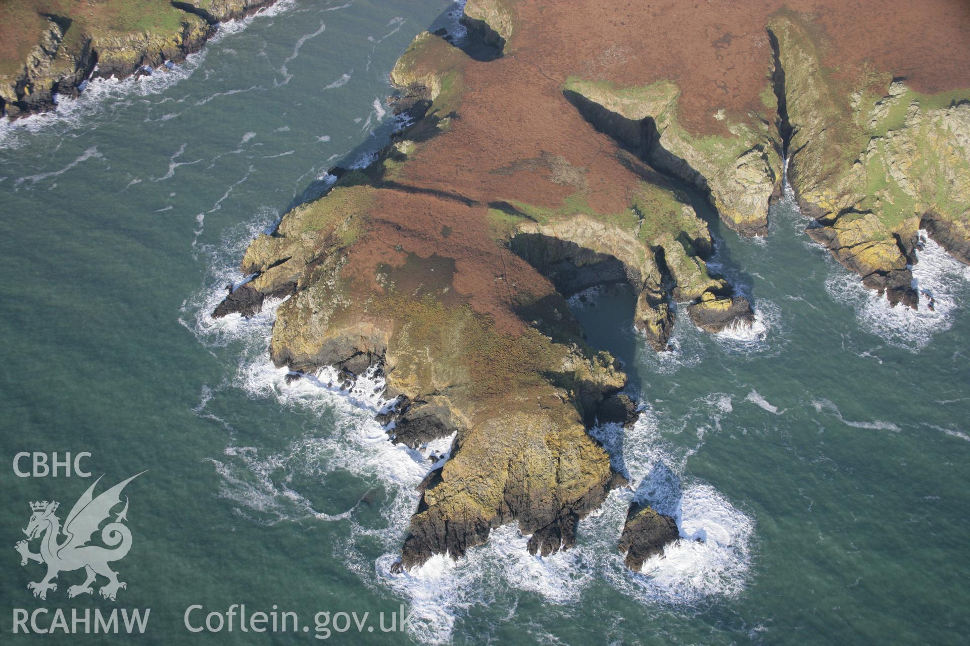 RCAHMW colour oblique aerial photograph of South Castle, Skomer from the south. Taken on 11 January 2006 by Toby Driver.