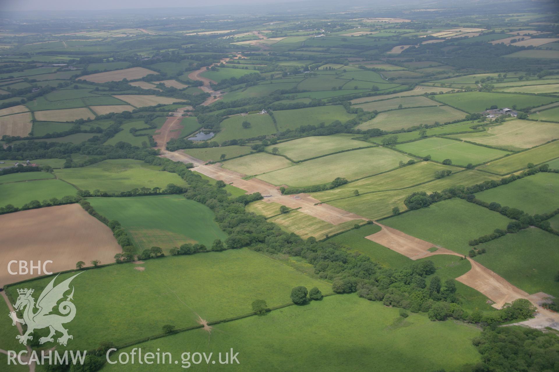 RCAHMW colour oblique aerial photograph of LNG Natural Gas Pipeline, Tavernspite, west of Whiteleys, viewed looking north-west. Taken on 15 June 2006 by Toby Driver.