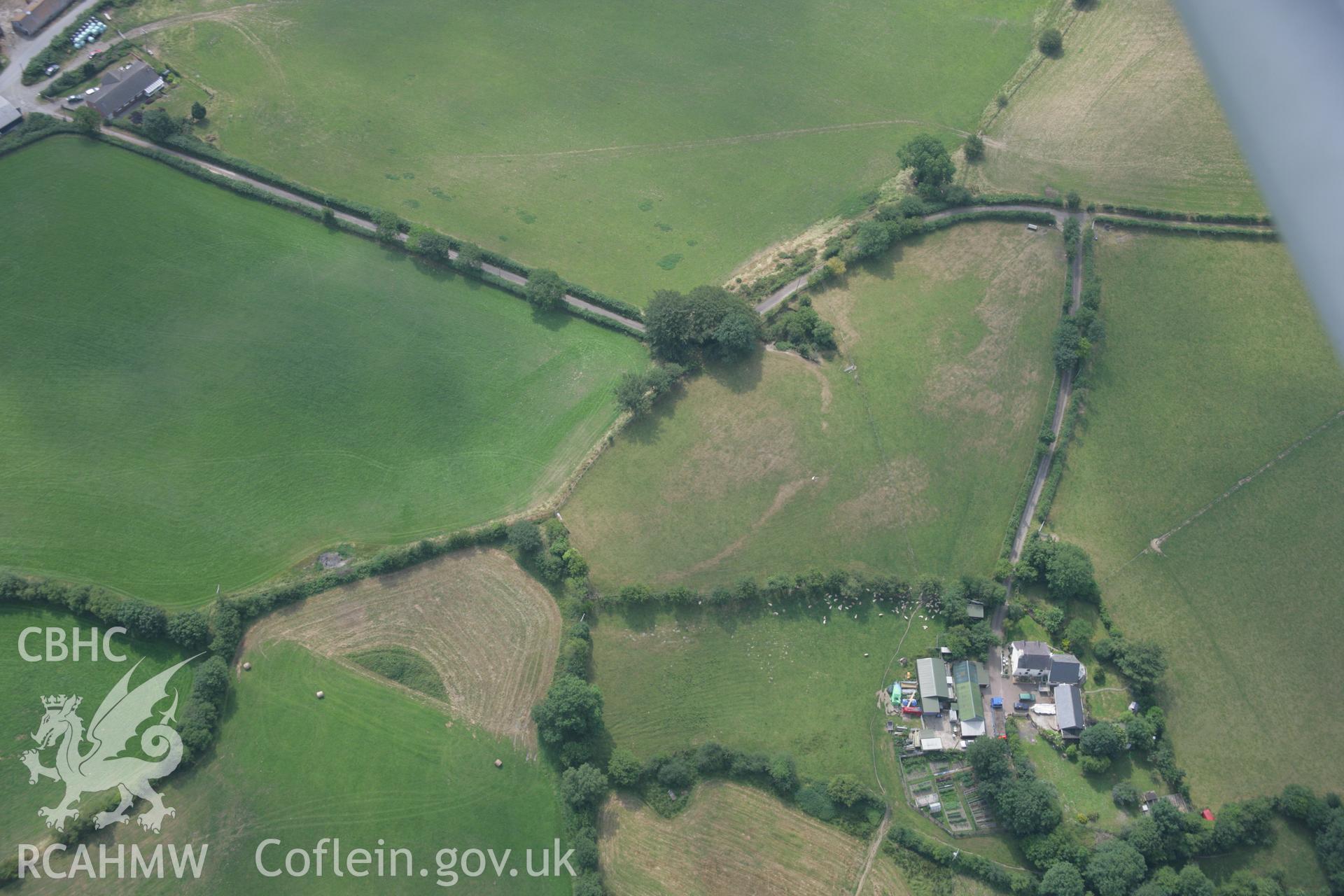 RCAHMW colour oblique aerial photograph of Pen-y-Gaer, Deri-Odwyn. Taken on 21 July 2006 by Toby Driver.