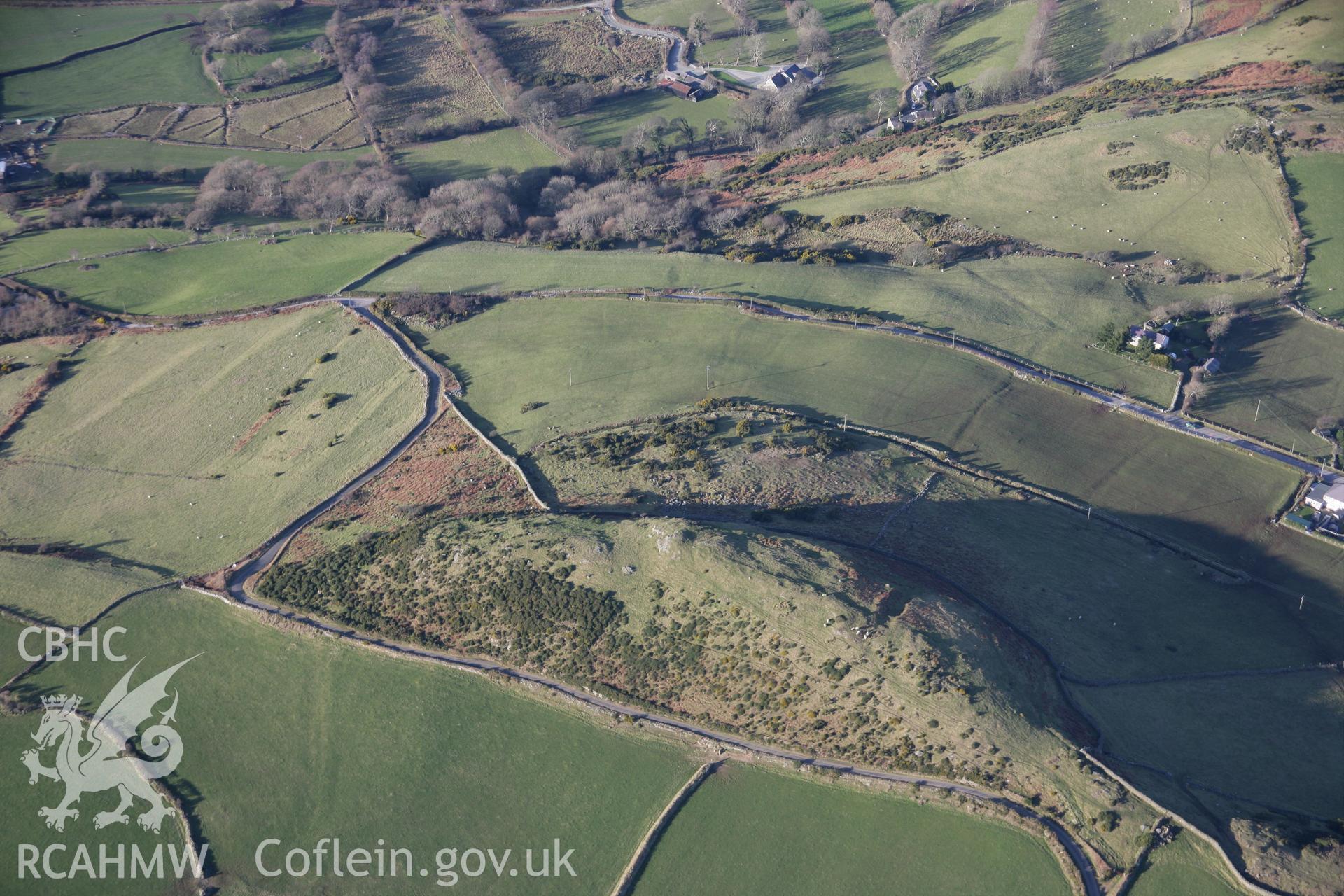 RCAHMW colour oblique aerial photograph of Pen-y-Garreg Hillfort, viewed from the south-east. Taken on 09 February 2006 by Toby Driver.