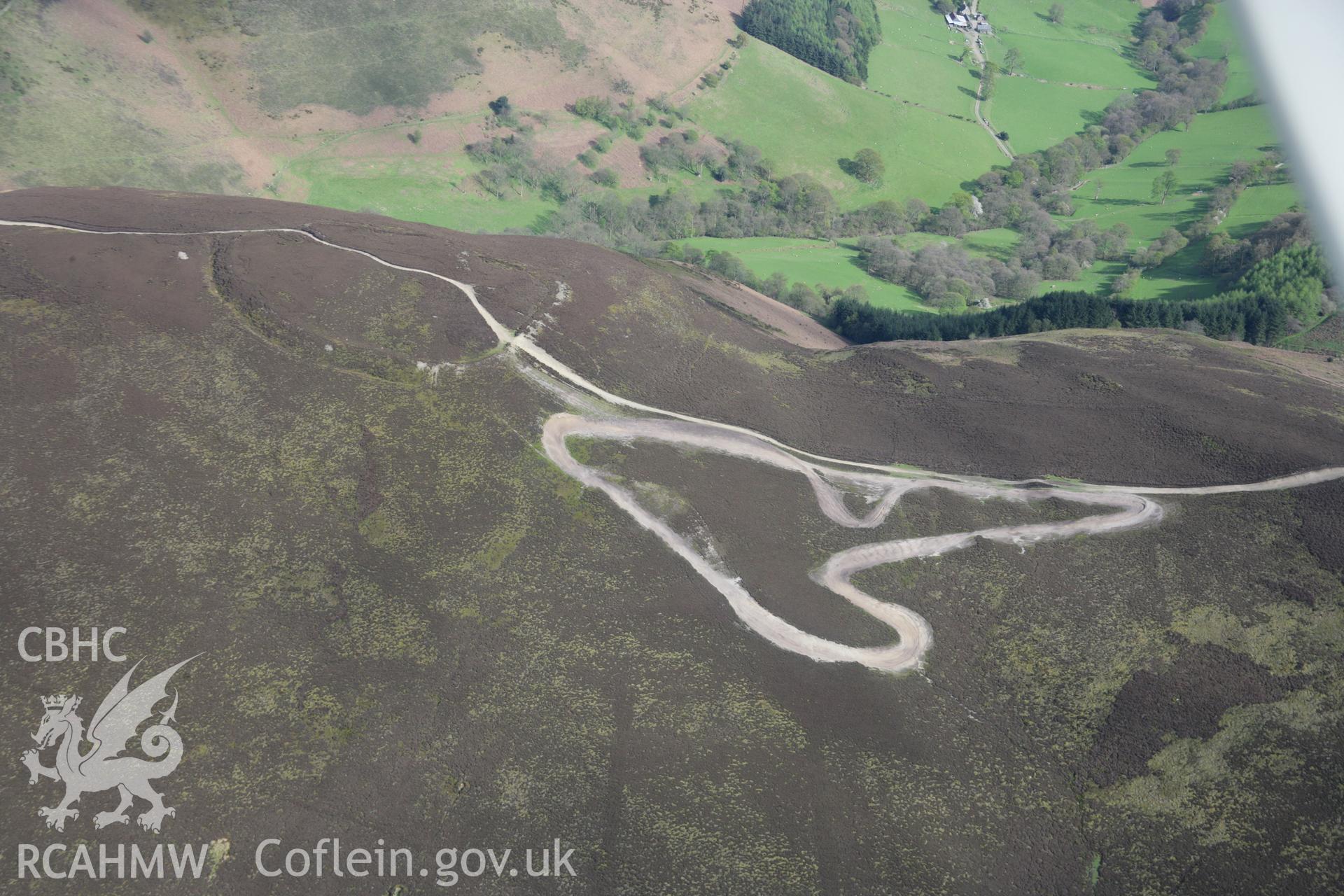 RCAHMW digital colour oblique photograph of Moel-y-Gaer Hillfort viewed from the south-east. Taken on 05/05/2006 by T.G. Driver.