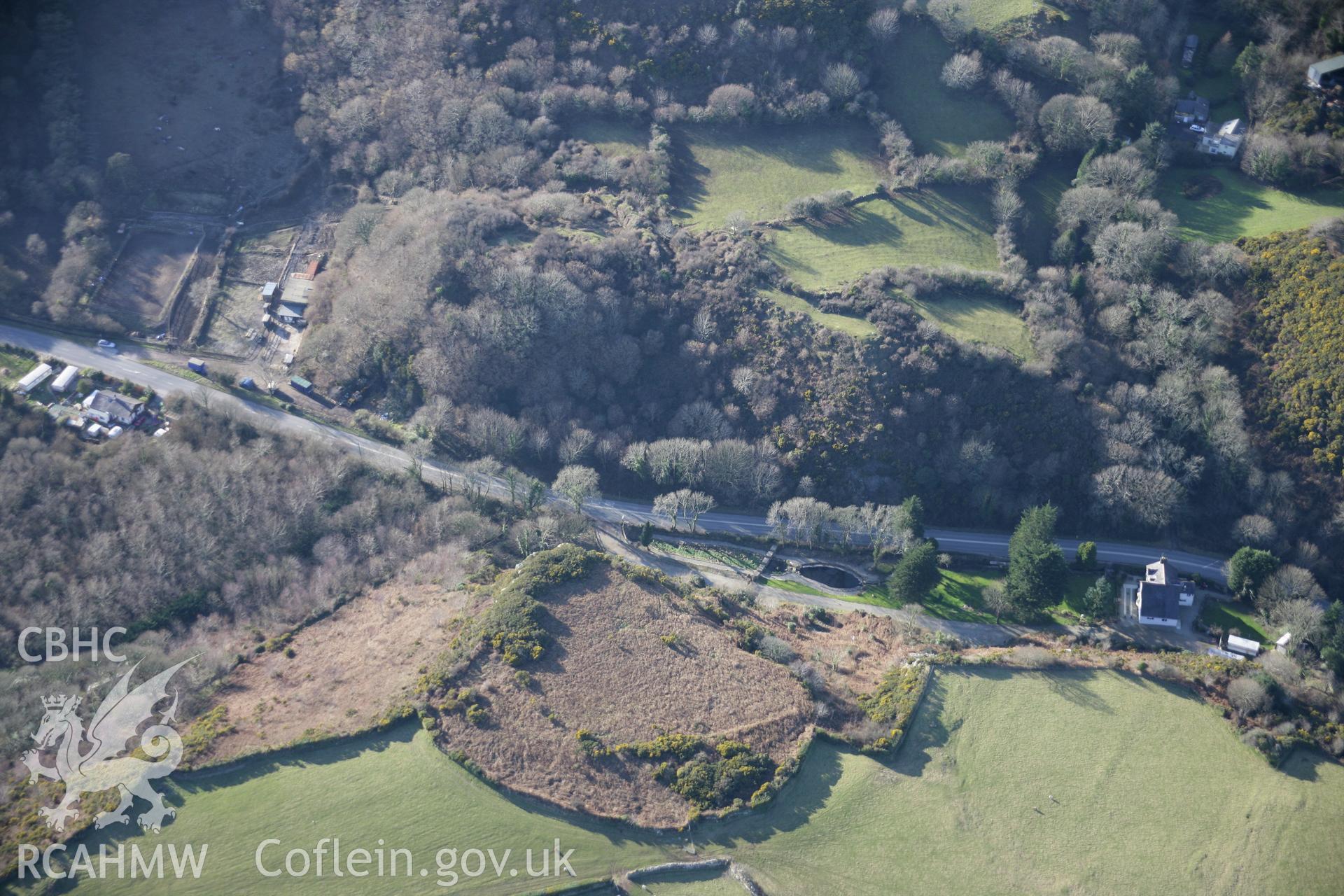 RCAHMW colour oblique aerial photograph of Pen-y-Gaer Promontary Fort Enclosure, viewed from the north-east. Taken on 09 February 2006 by Toby Driver.