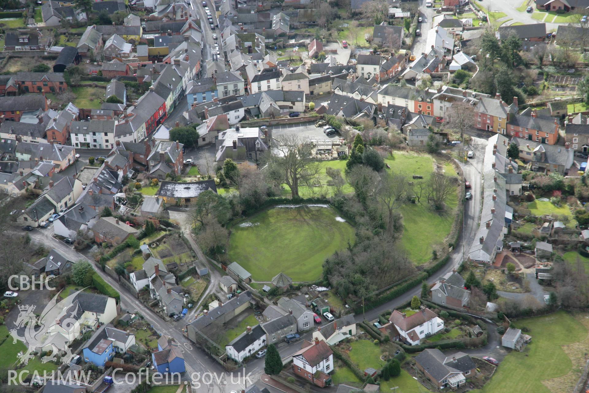 RCAHMW colour oblique aerial photograph of Bishops Castle from the north. Taken on 06 March 2006 by Toby Driver.