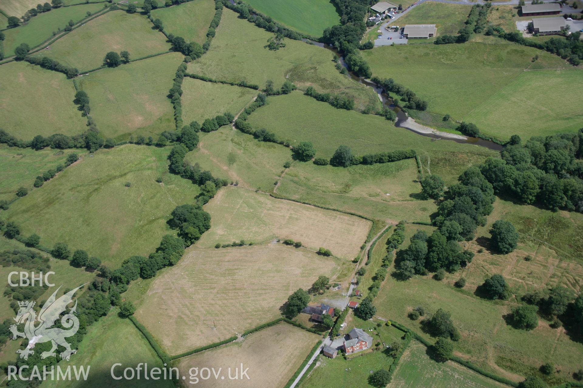 RCAHMW colour oblique aerial photograph of Castell Collen Roman Fort. Taken on 27 July 2006 by Toby Driver.