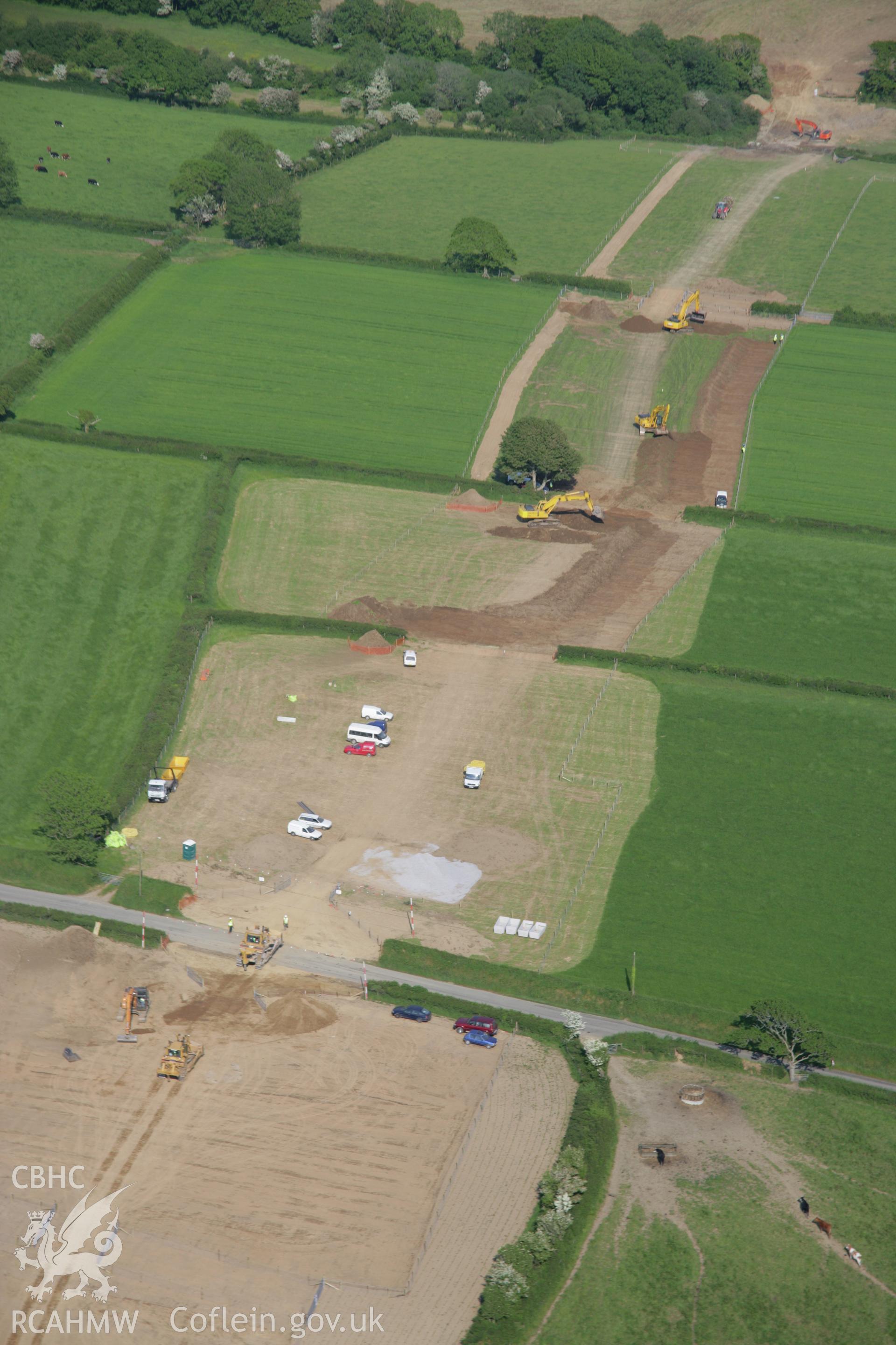 RCAHMW colour oblique aerial photograph of LNG Natural Gas Pipeline, under construction at Tavernspite, viewed looking to the east. Taken on 08 June 2006 by Toby Driver