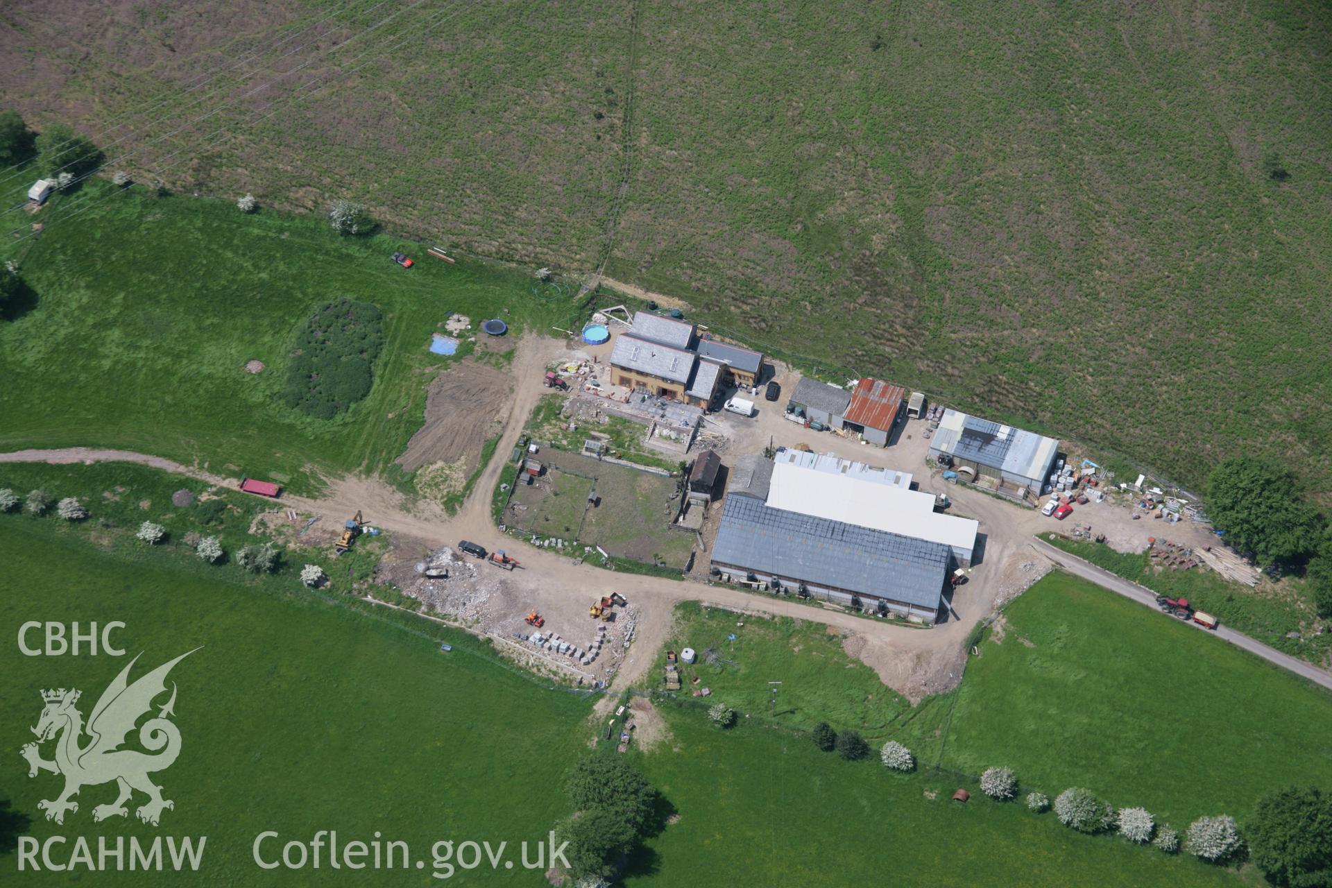 RCAHMW colour oblique aerial photograph of an unlocated farm west of Green Meadow in Cwmbran. Taken on 09 June 2006 by Toby Driver.