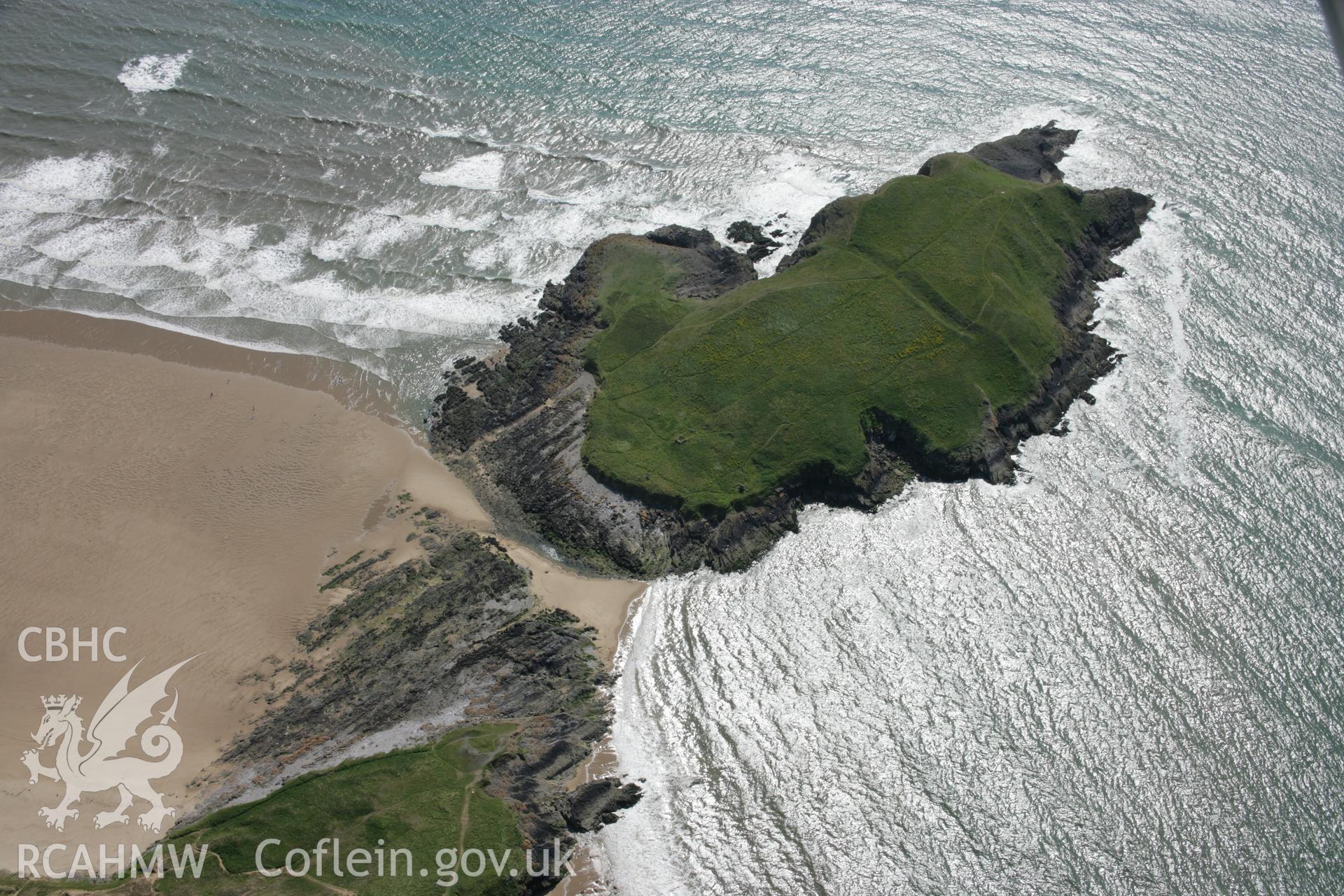 RCAHMW colour oblique aerial photograph of Burry Holms Promontory Fort. Taken on 11 July 2006 by Toby Driver.