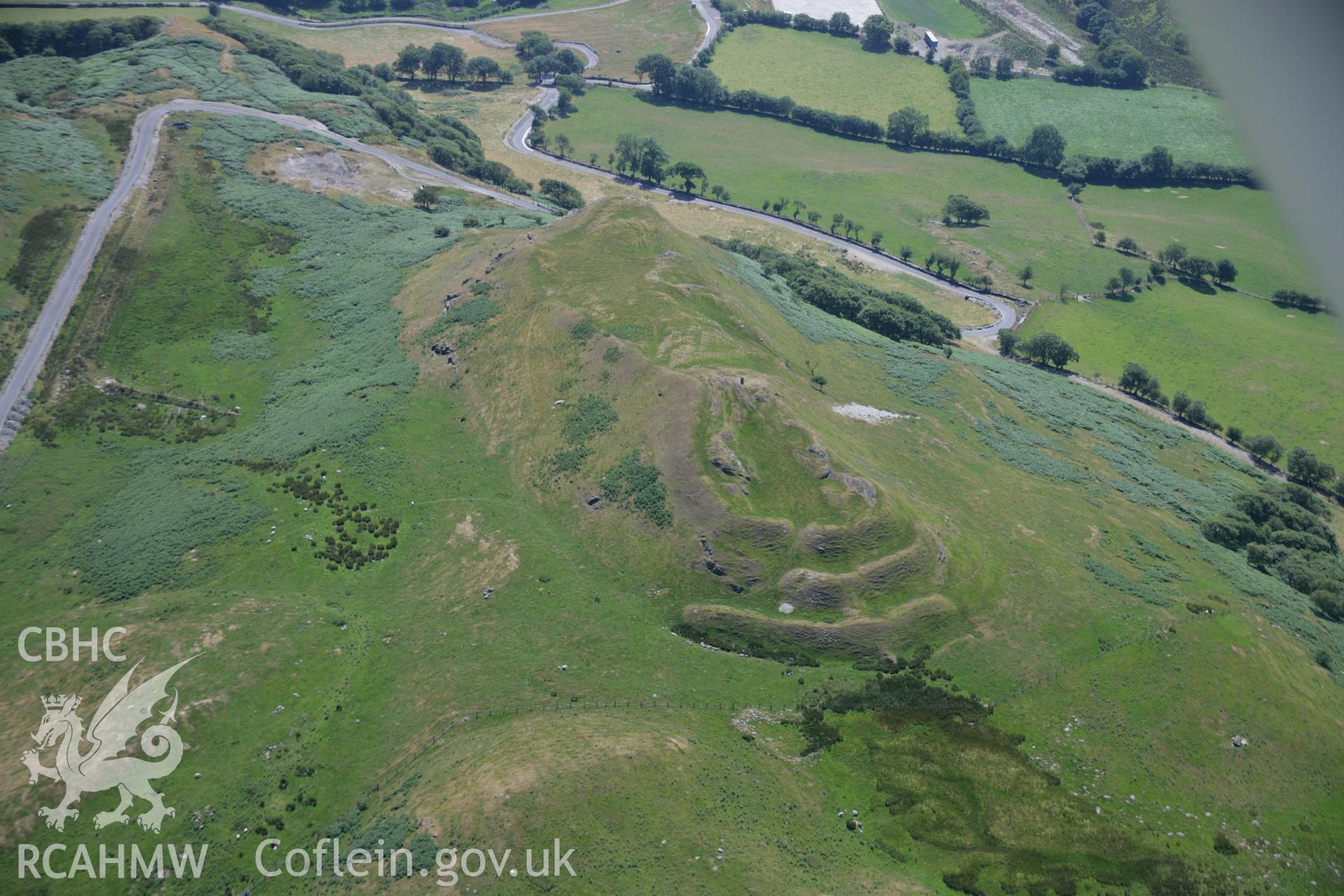 RCAHMW colour oblique aerial photograph of Pen-y-Bannau Hillfort. Taken on 17 July 2006 by Toby Driver.