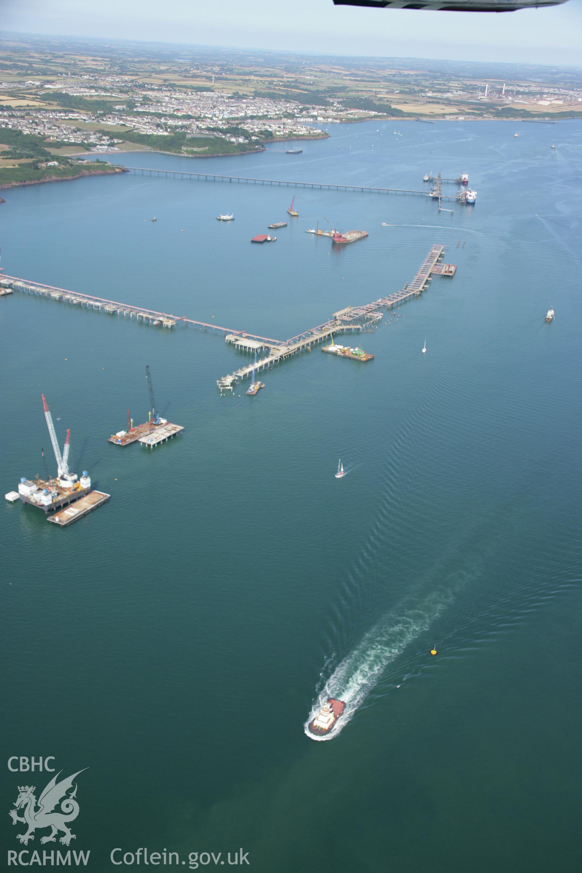 RCAHMW colour oblique aerial photograph of the west jetty at South Hook Point, Milford Haven. Taken on 24 July 2006 by Toby Driver.