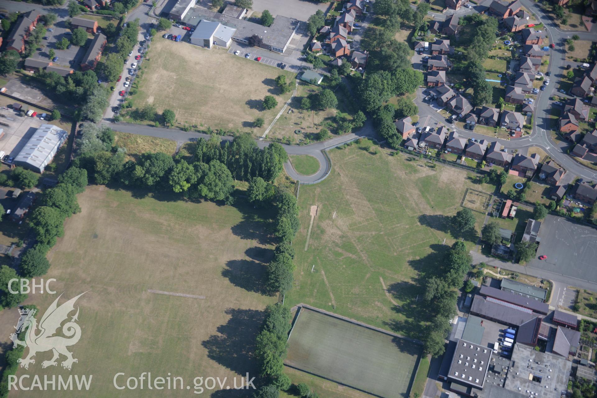 RCAHMW colour oblique aerial photograph of cropmarks of Former Barracks at Hightown. Taken on 17 July 2006 by Toby Driver.