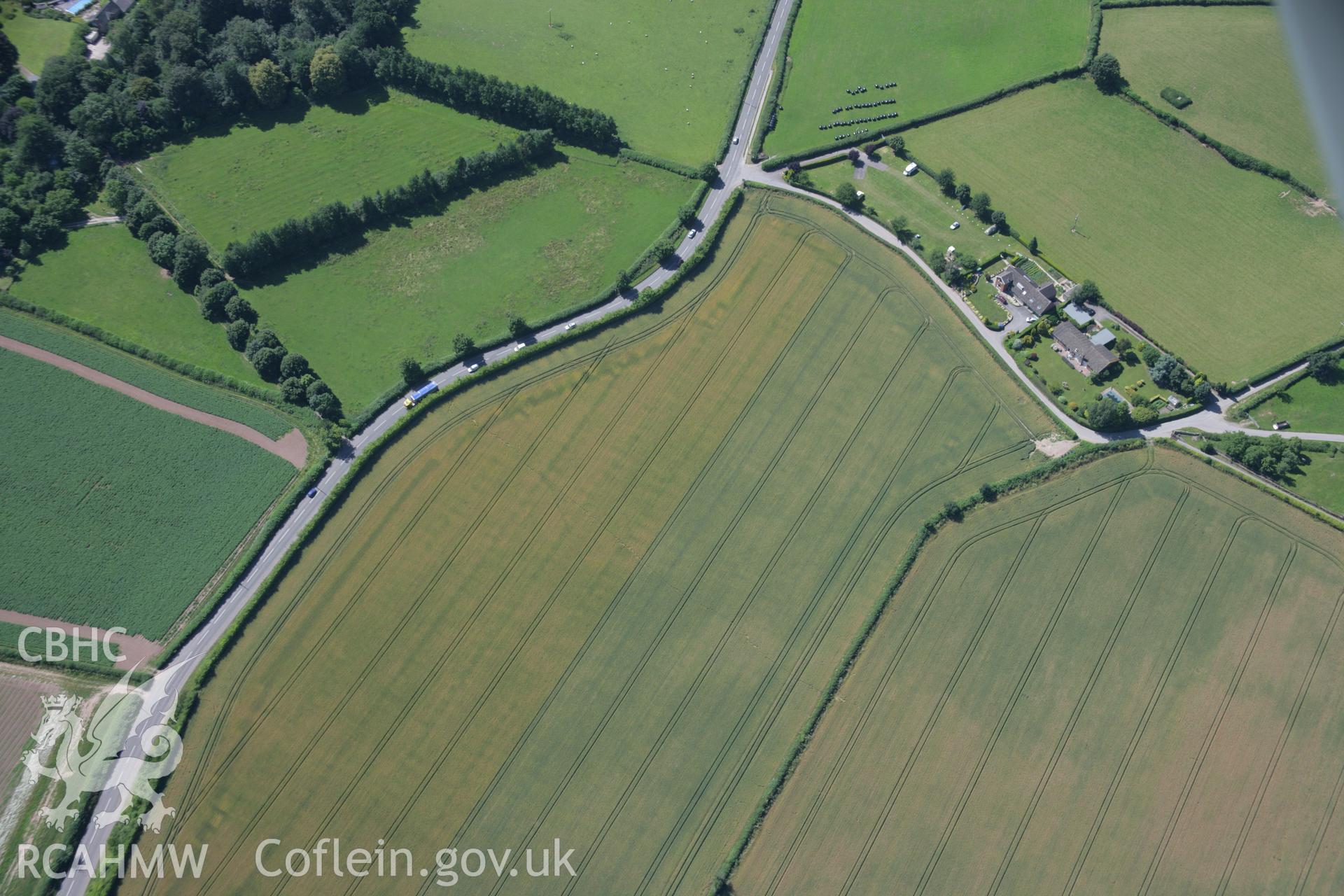 RCAHMW colour oblique aerial photograph of Clyro Roman Fort showing cropmarks at Boatside. Taken on 13 July 2006 by Toby Driver.