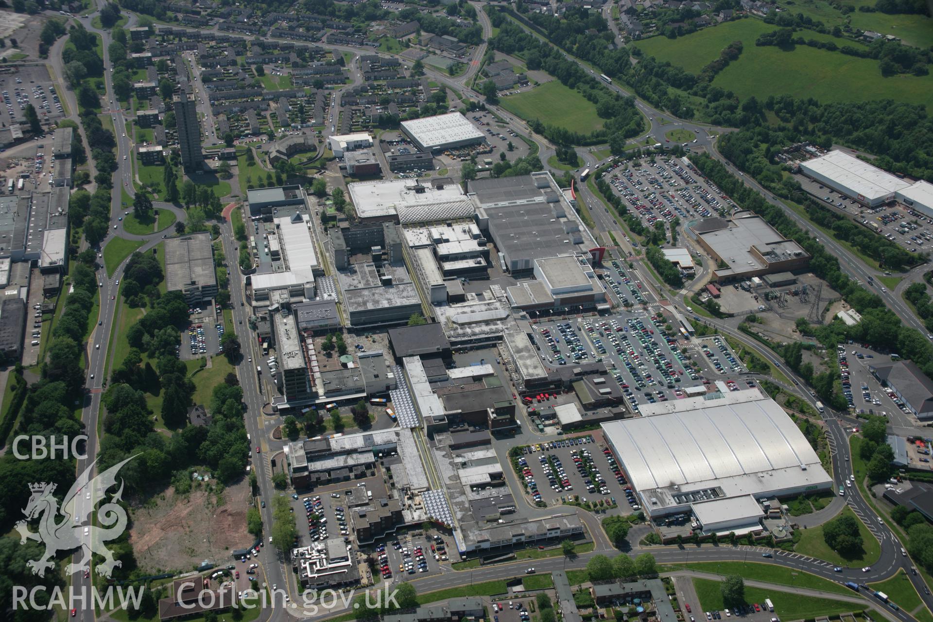 RCAHMW colour oblique aerial photograph of Cwmbran Shopping Centre from the north-east. Taken on 09 June 2006 by Toby Driver.
