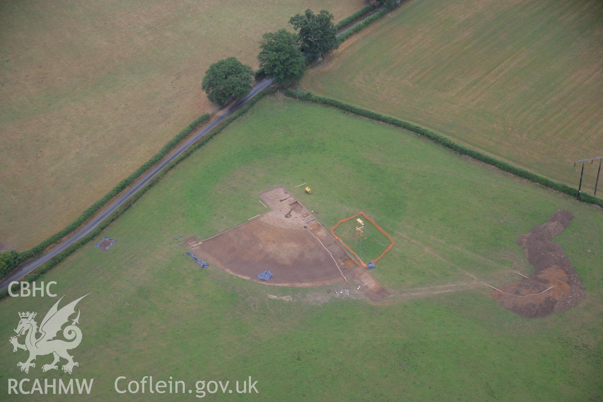 RCAHMW colour oblique aerial photograph of Dyffryn Lane Henge during excavation. Taken on 31 July 2006 by Toby Driver.