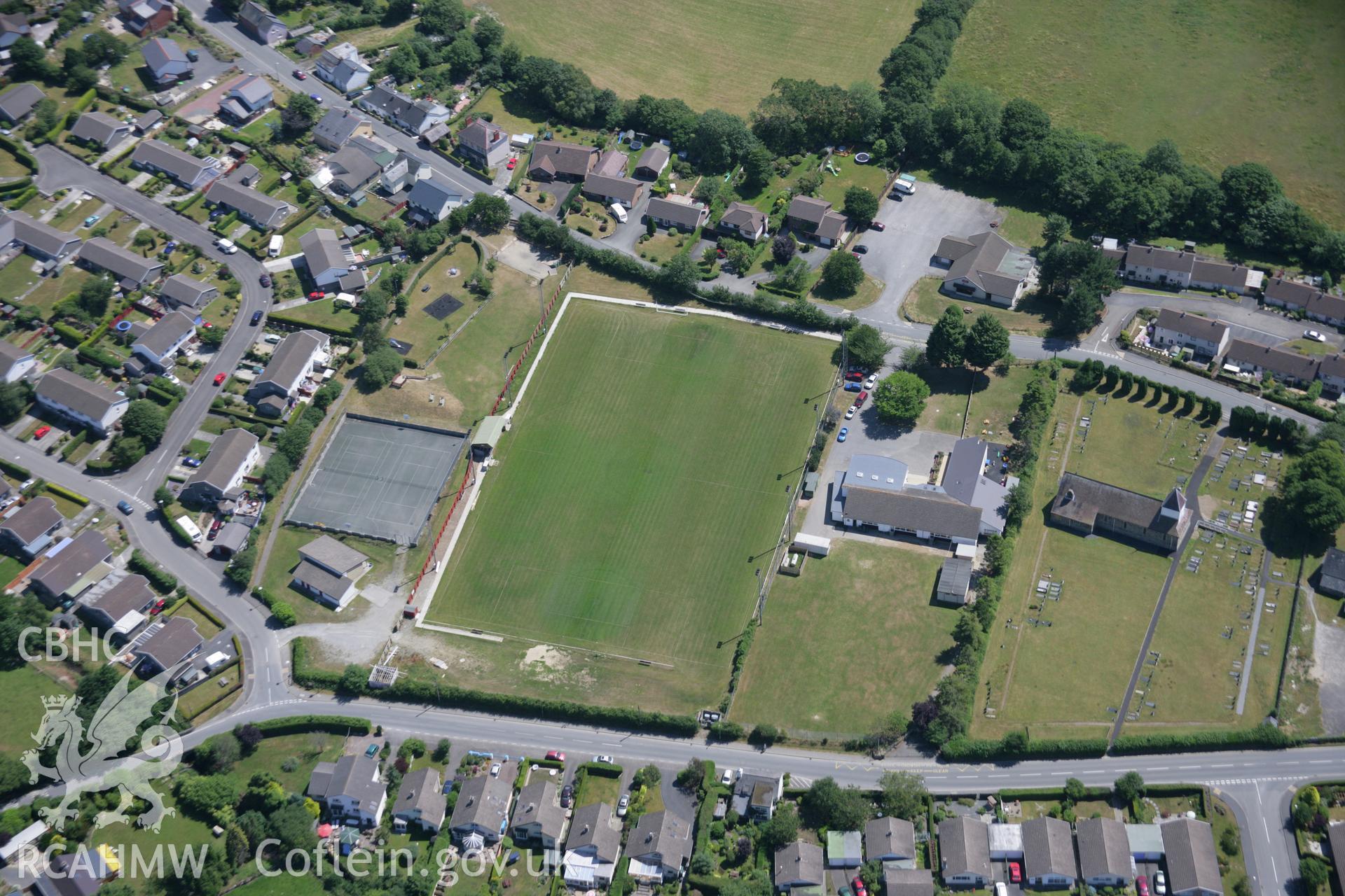 RCAHMW colour oblique aerial photograph of Penrhyncoch Village. Taken on 17 July 2006 by Toby Driver.