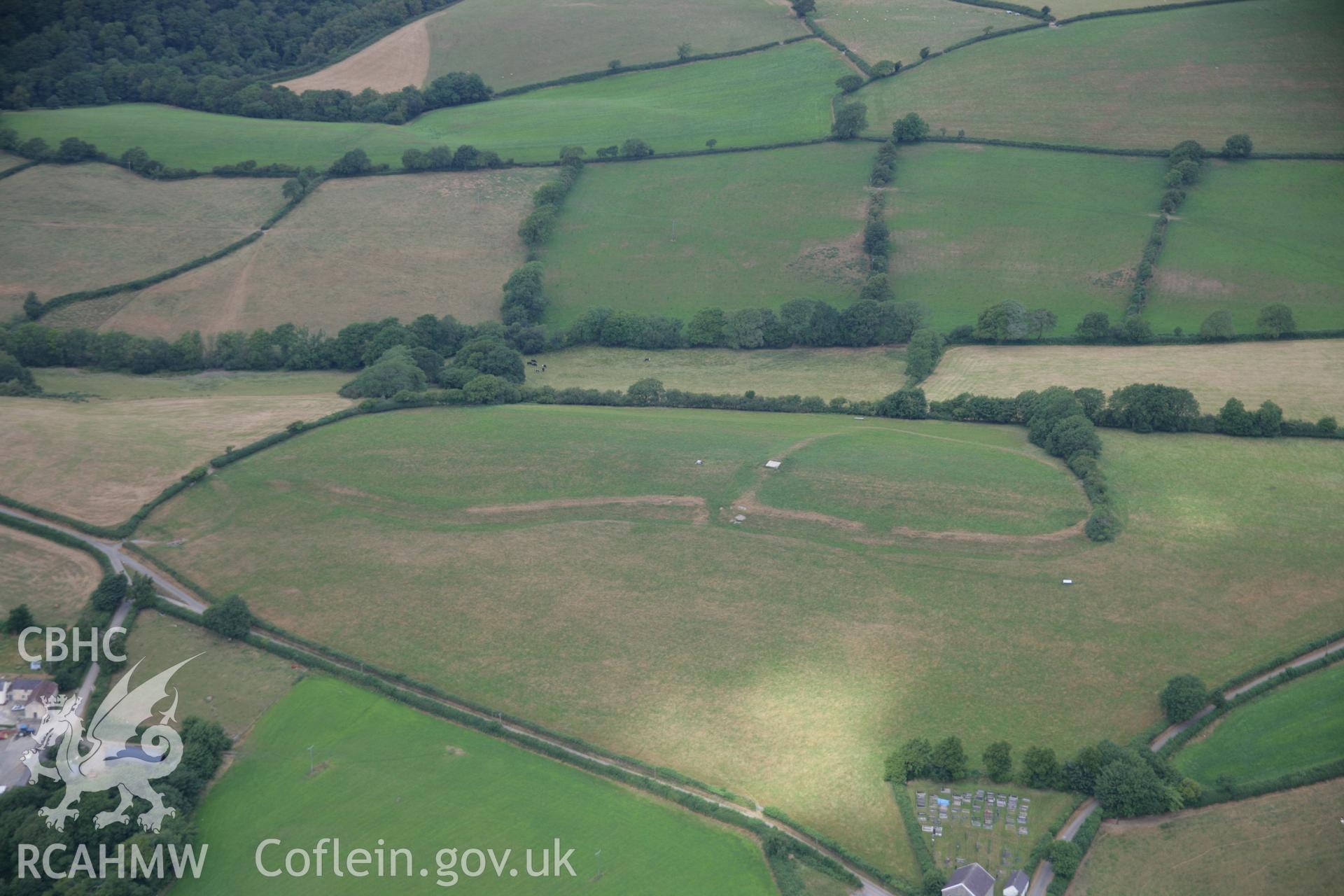 RCAHMW colour oblique aerial photograph of Pen-y-Gaer, Meidrim. Taken on 27 July 2006 by Toby Driver.