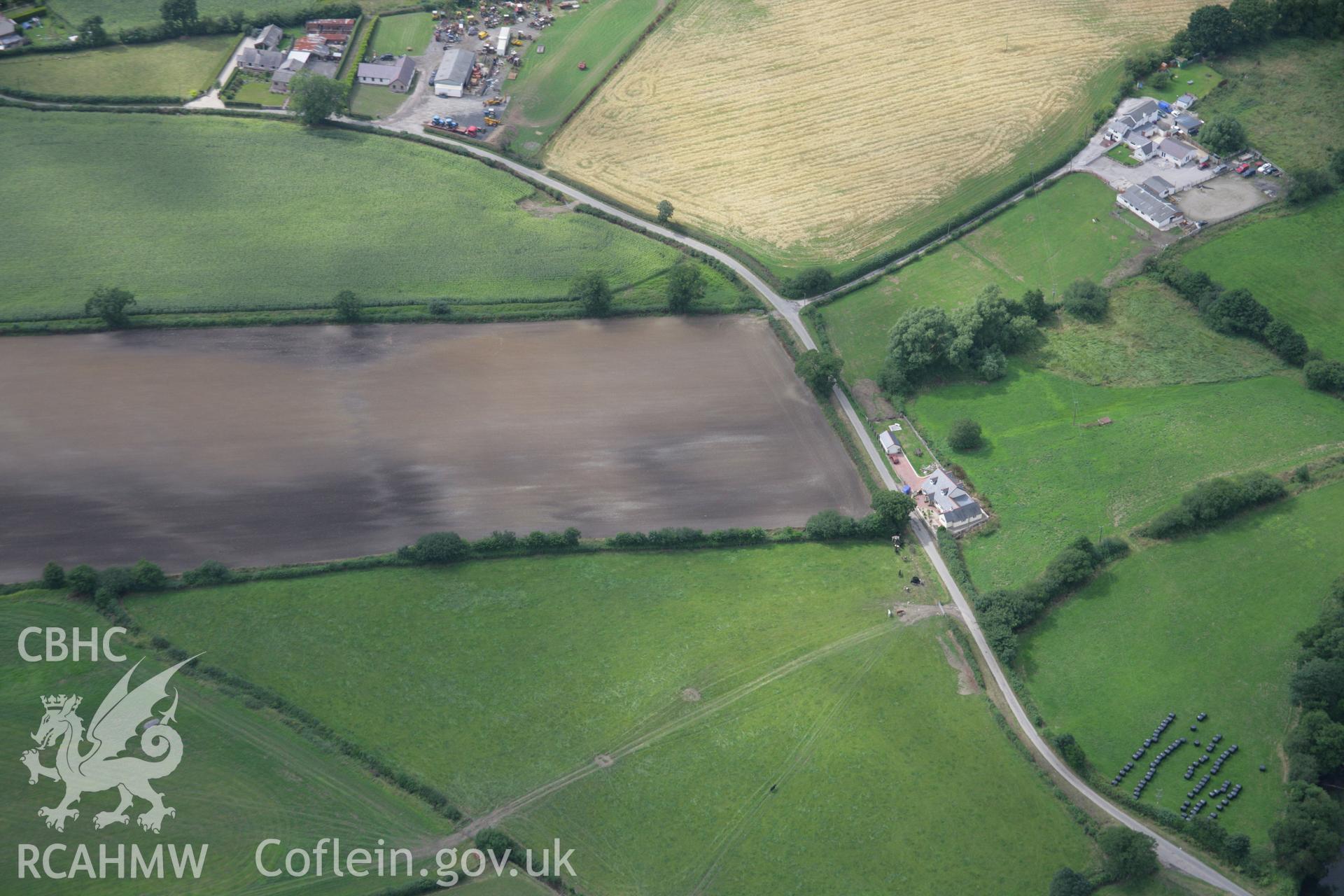 RCAHMW colour oblique aerial photograph of a possible moated site at Pont Perfa. Taken on 14 August 2006 by Toby Driver