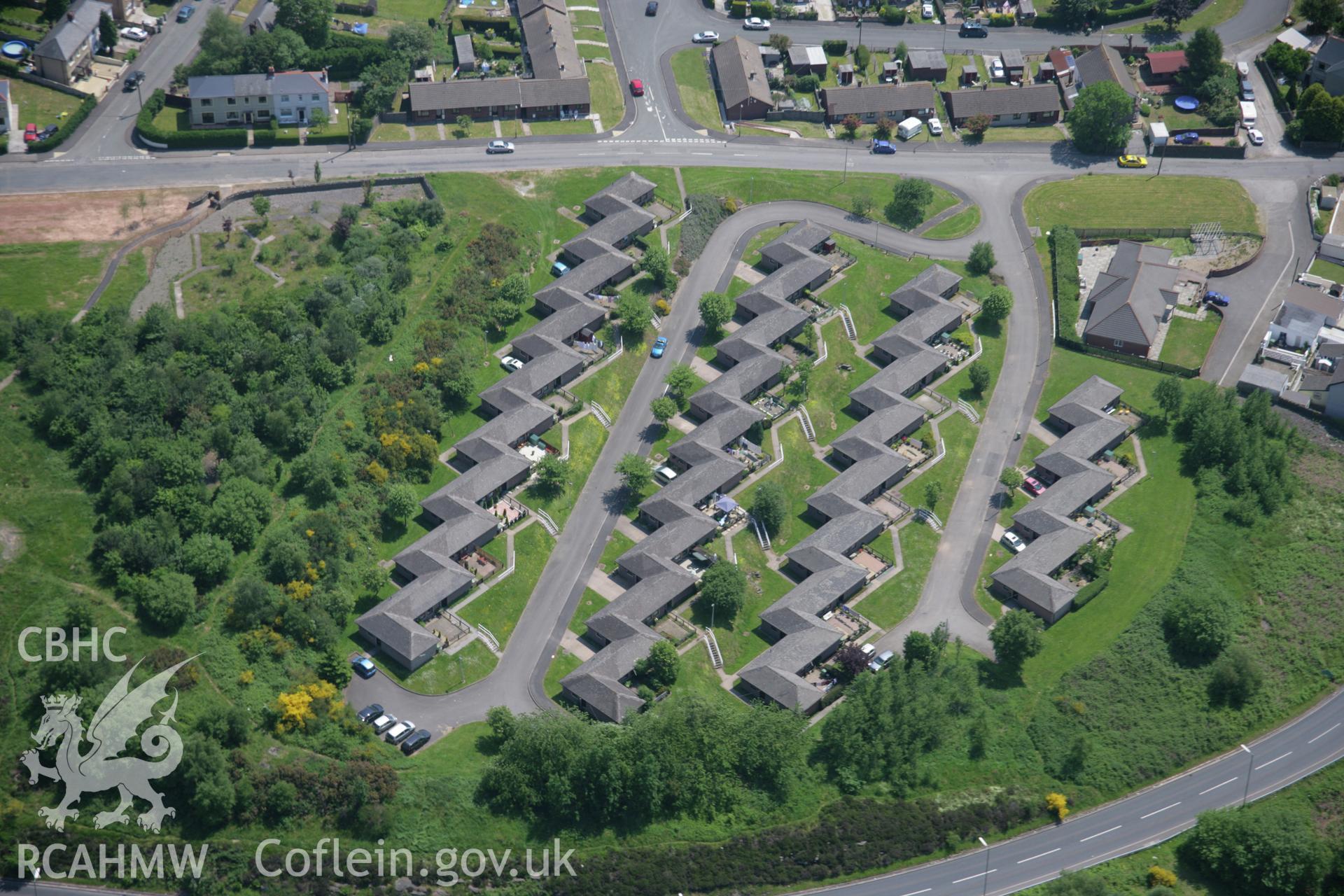 RCAHMW colour oblique aerial photograph of Bargoed, including the housing estate. View from the north-west. Taken on 09 June 2006 by Toby Driver.