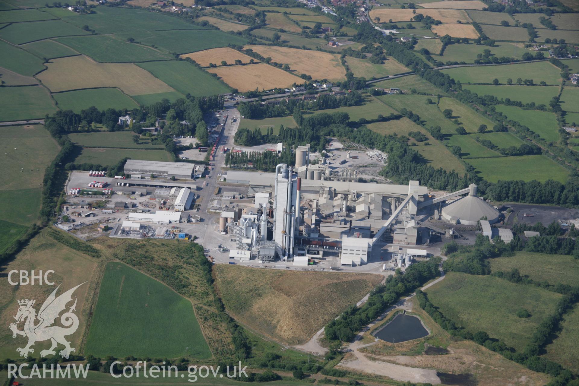 RCAHMW colour oblique aerial photograph of Cement Works, Penyffordd. Taken on 17 July 2006 by Toby Driver.