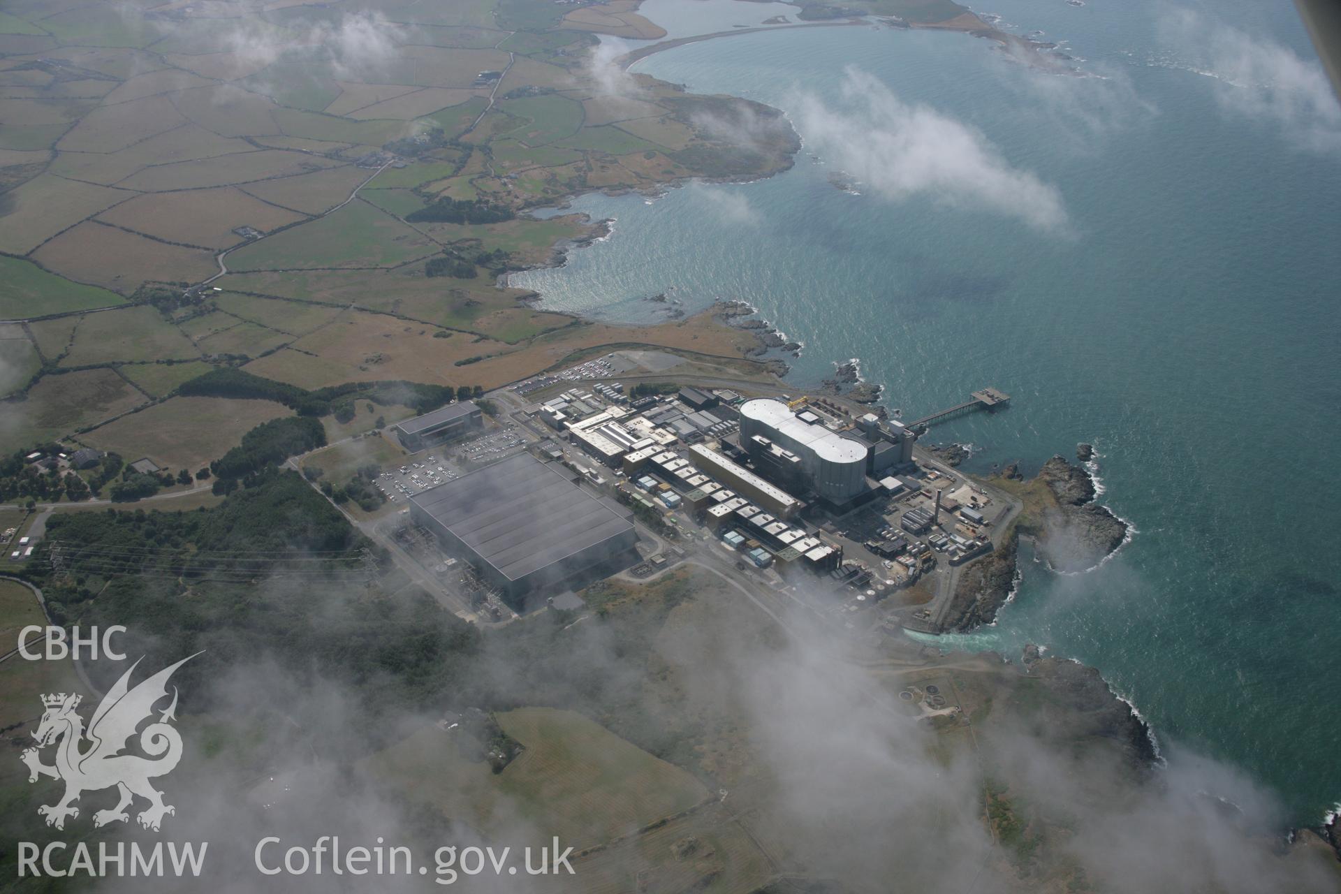 RCAHMW colour oblique aerial photograph of Wylfa Nuclear Power Station. Taken on 14 August 2006 by Toby Driver.