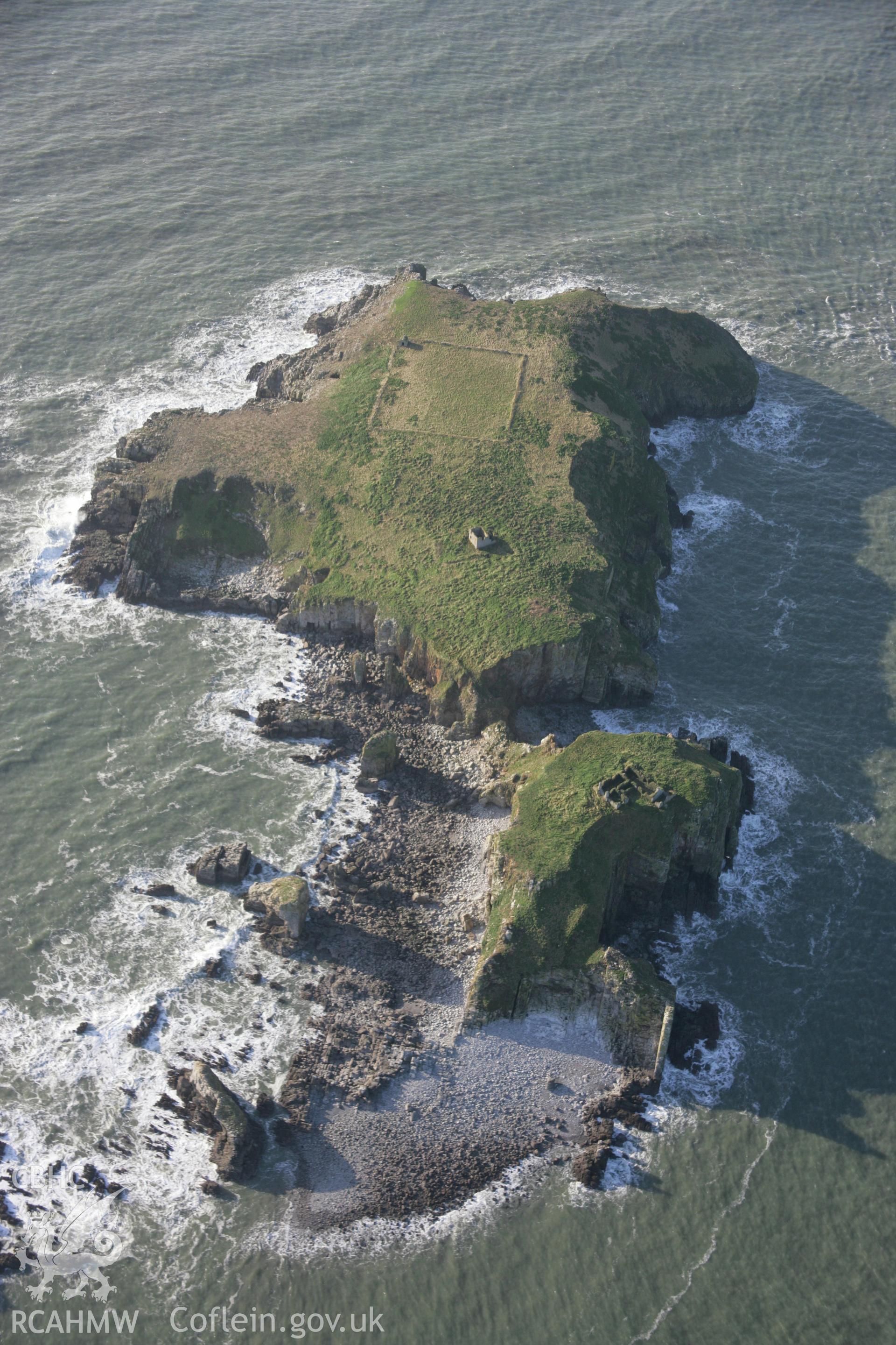 RCAHMW colour oblique aerial photograph of ruins of monastic buildings on St Margarets Island from the east. Taken on 11 January 2006 by Toby Driver.