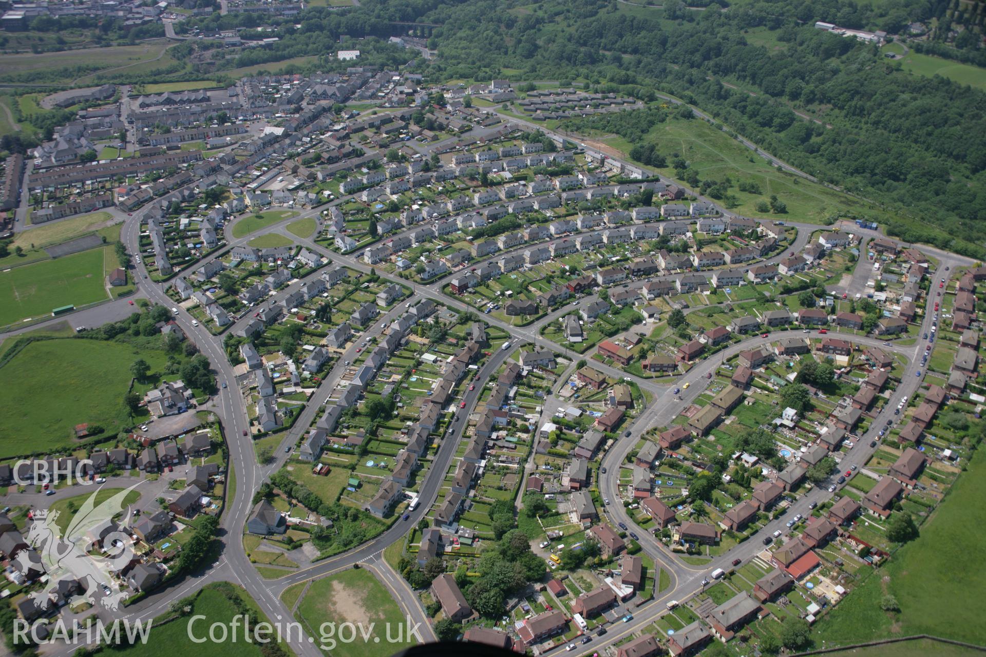 RCAHMW colour oblique aerial photograph of Bargoed, including the housing estate. View from the north-east. Taken on 09 June 2006 by Toby Driver.