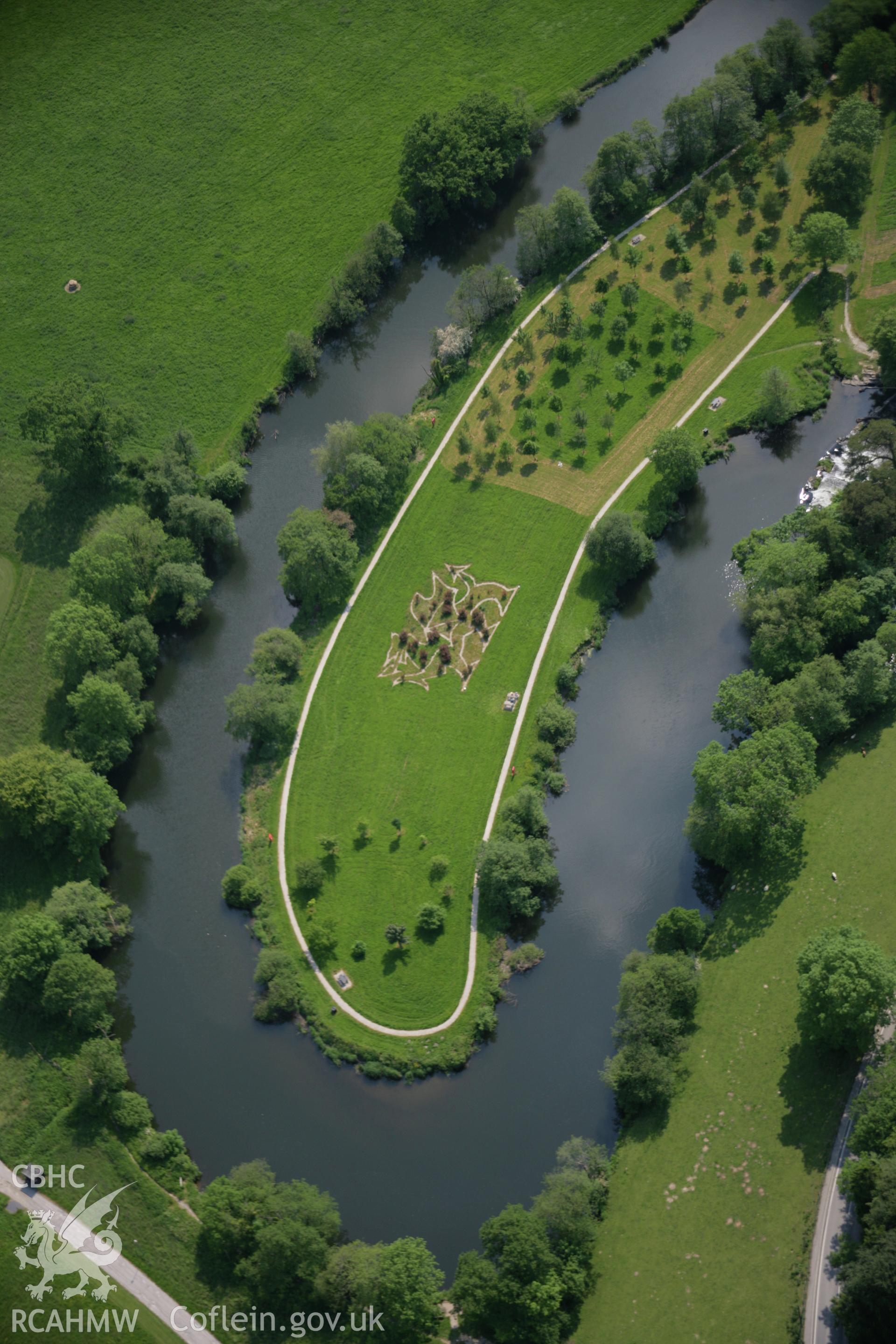 RCAHMW colour oblique aerial photograph of Newcastle Emlyn, showing dragon and park, viewed from the north-east. Taken on 08 June 2006 by Toby Driver.