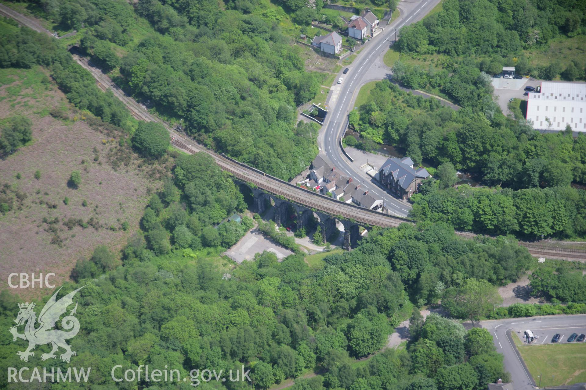 RCAHMW colour oblique aerial photograph of Bargoed and the railway viaduct viewed from the west. Taken on 09 June 2006 by Toby Driver.