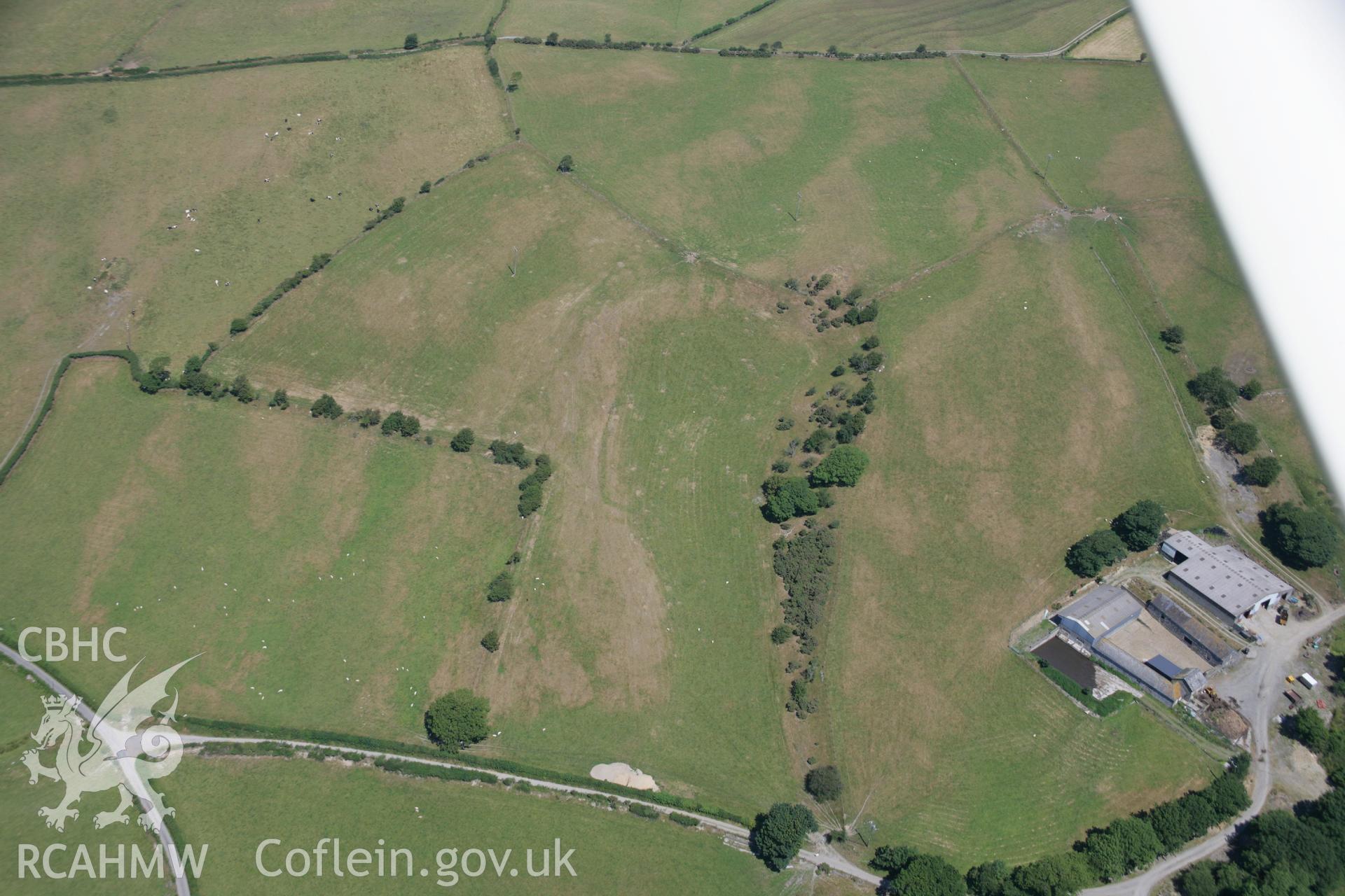 RCAHMW colour oblique aerial photograph of Cynnull-Mawr Enclosure. Taken on 17 July 2006 by Toby Driver.