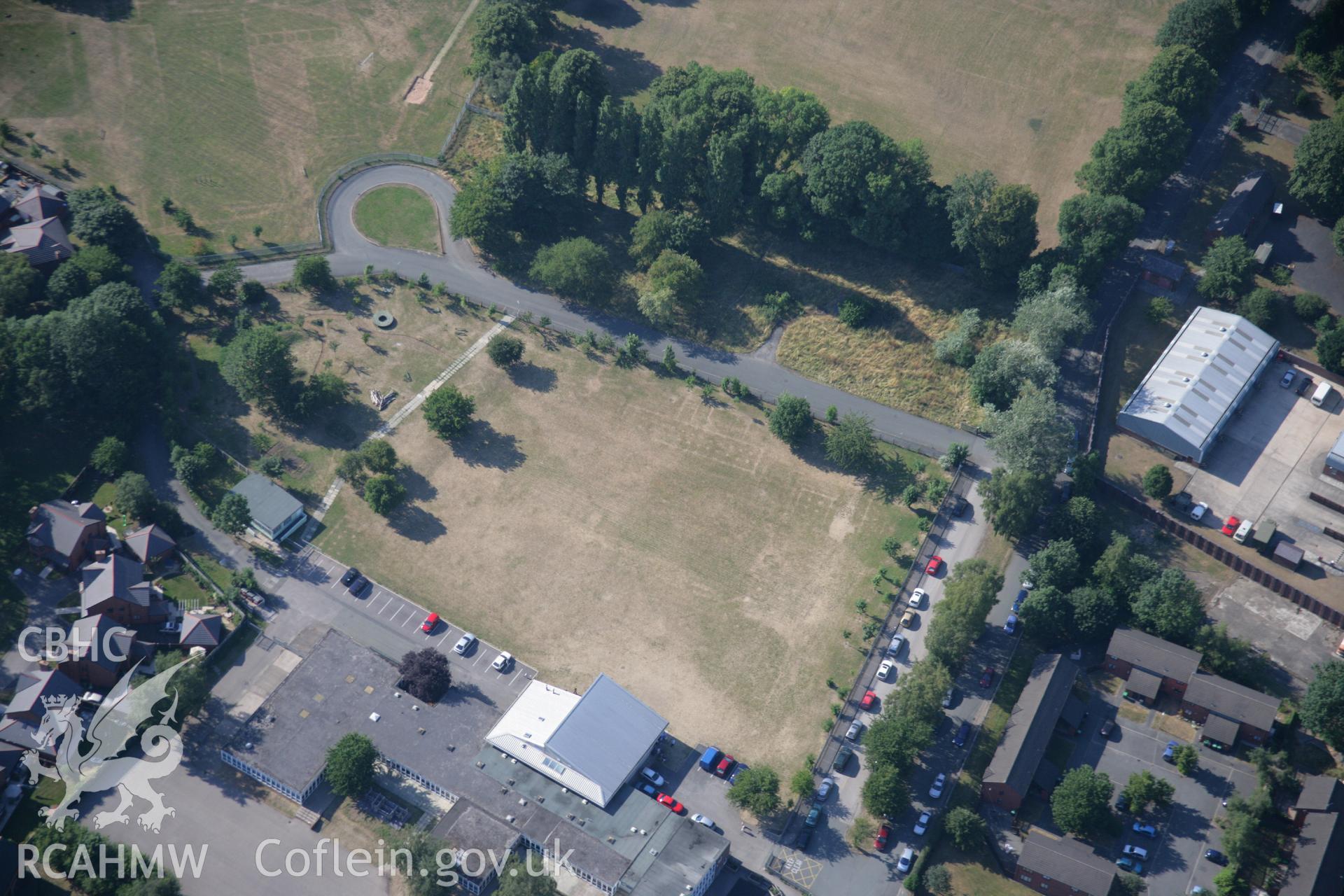RCAHMW colour oblique aerial photograph of cropmarks of Former Barracks at Hightown. Taken on 17 July 2006 by Toby Driver.