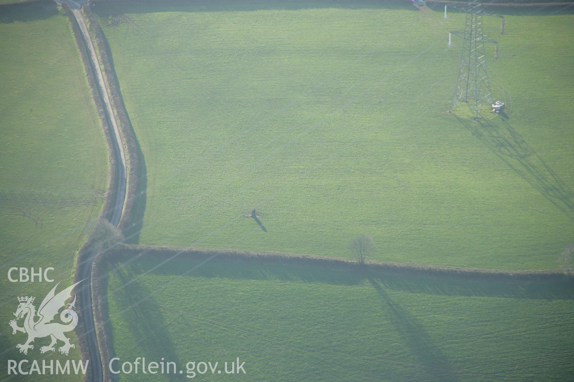 RCAHMW colour oblique aerial photograph of Gwempa Standing Stone from the north-east. Taken on 26 January 2006 by Toby Driver.