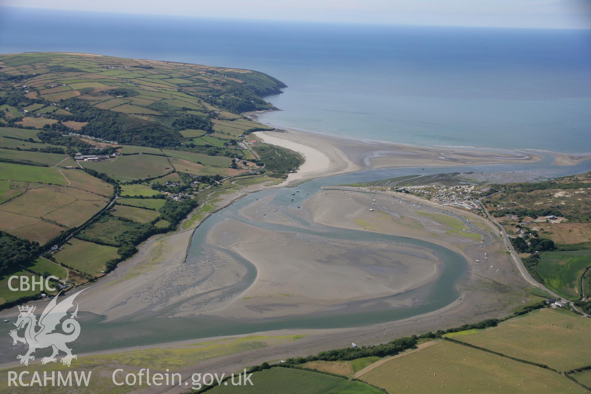 RCAHMW colour oblique aerial photograph of Patch Caravan Park, south of Gwbert showing coastal landscape of Poppit Sands. Taken on 27 July 2006 by Toby Driver.