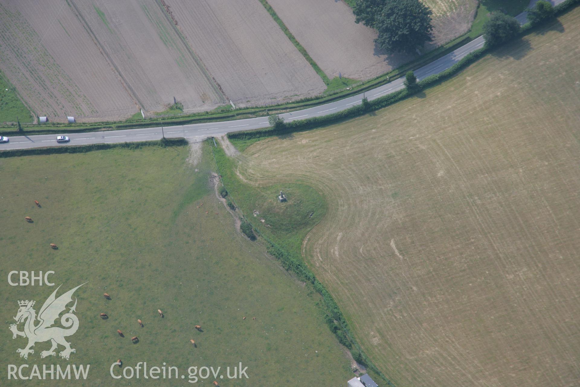 RCAHMW colour oblique aerial photograph of Eliseg's Pillar, Cross and Burial Mound, near Llangollen. Taken on 04 July 2006 by Toby Driver.