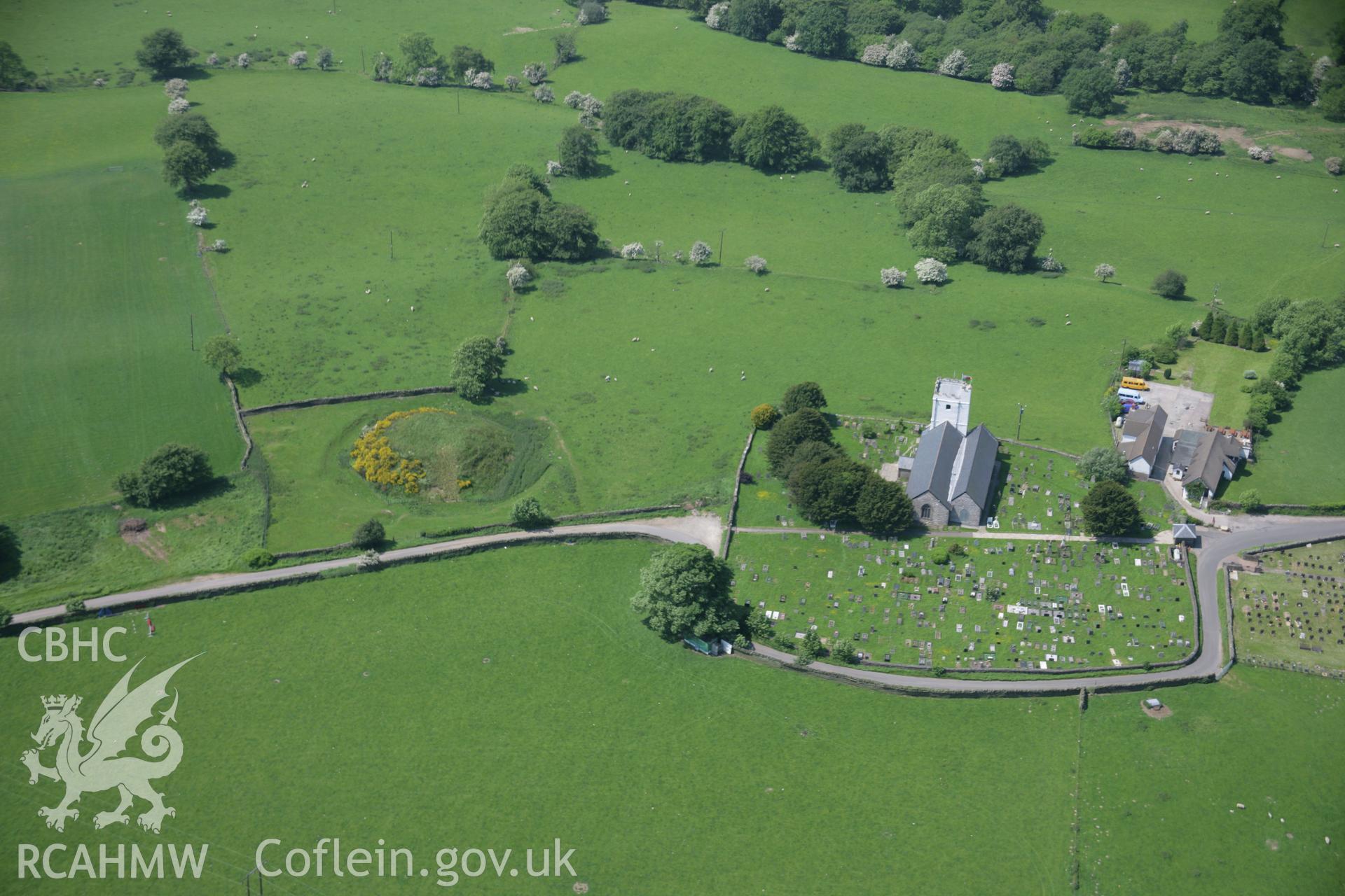 RCAHMW colour oblique aerial photograph of Twyn Tudur Motte from the east. Taken on 09 June 2006 by Toby Driver.