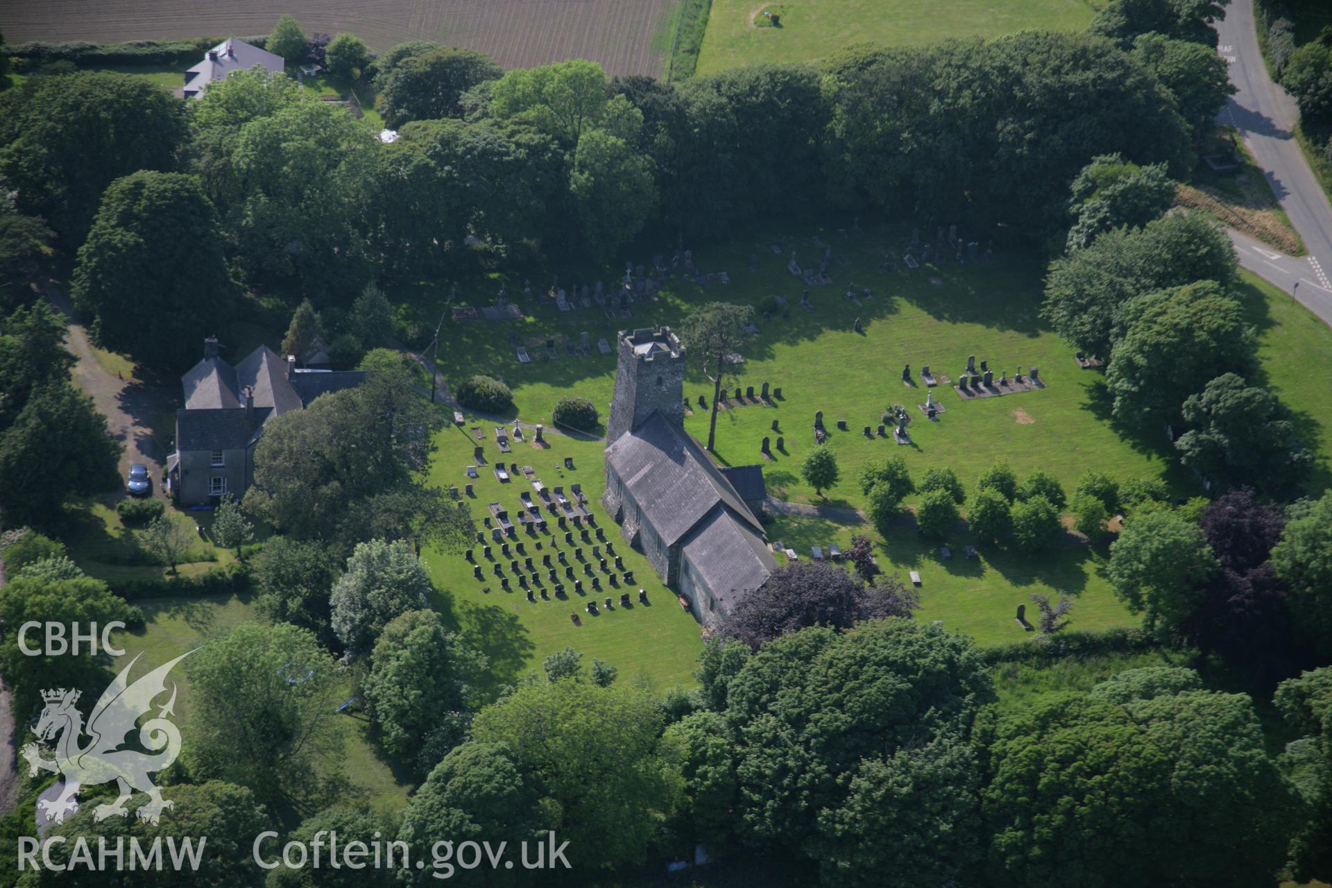 RCAHMW colour oblique aerial photograph of Wiston Parish Church from the east. Taken on 08 June 2006 by Toby Driver.