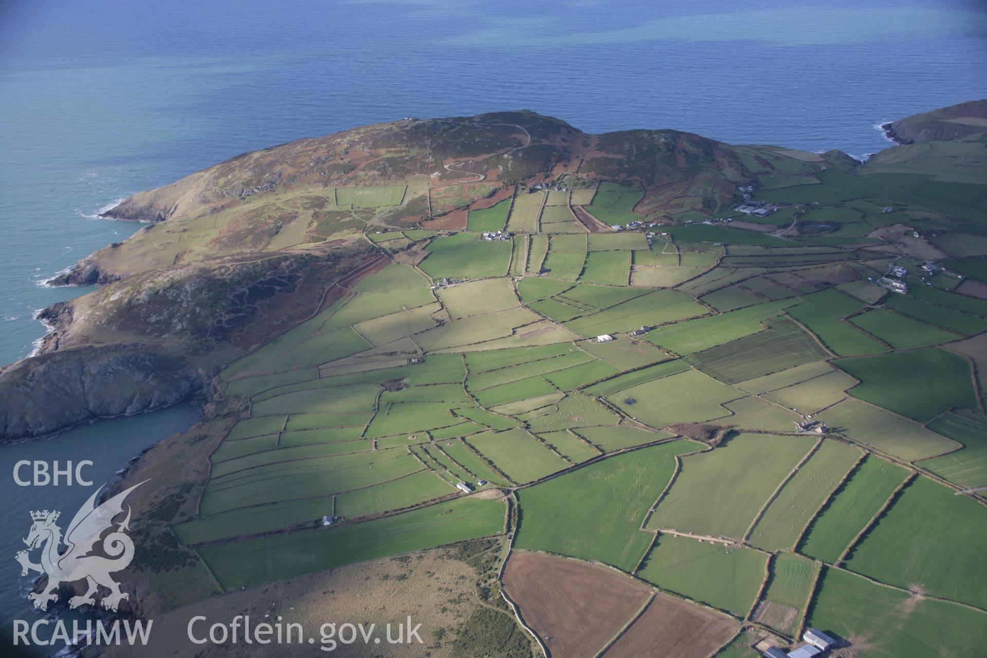 RCAHMW colour oblique aerial photograph of old field systems, Mynydd Mawr, Uwchmynydd, in wide landscape view looking towards the north-west. Taken on 09 February 2006 by Toby Driver