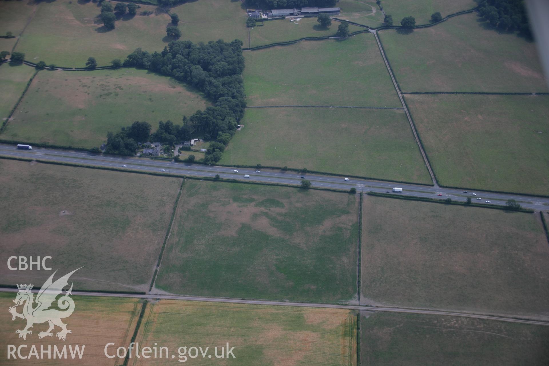 RCAHMW colour oblique aerial photograph of Coed Bryn Meddyg Relict Field System. Taken on 25 July 2006 by Toby Driver.