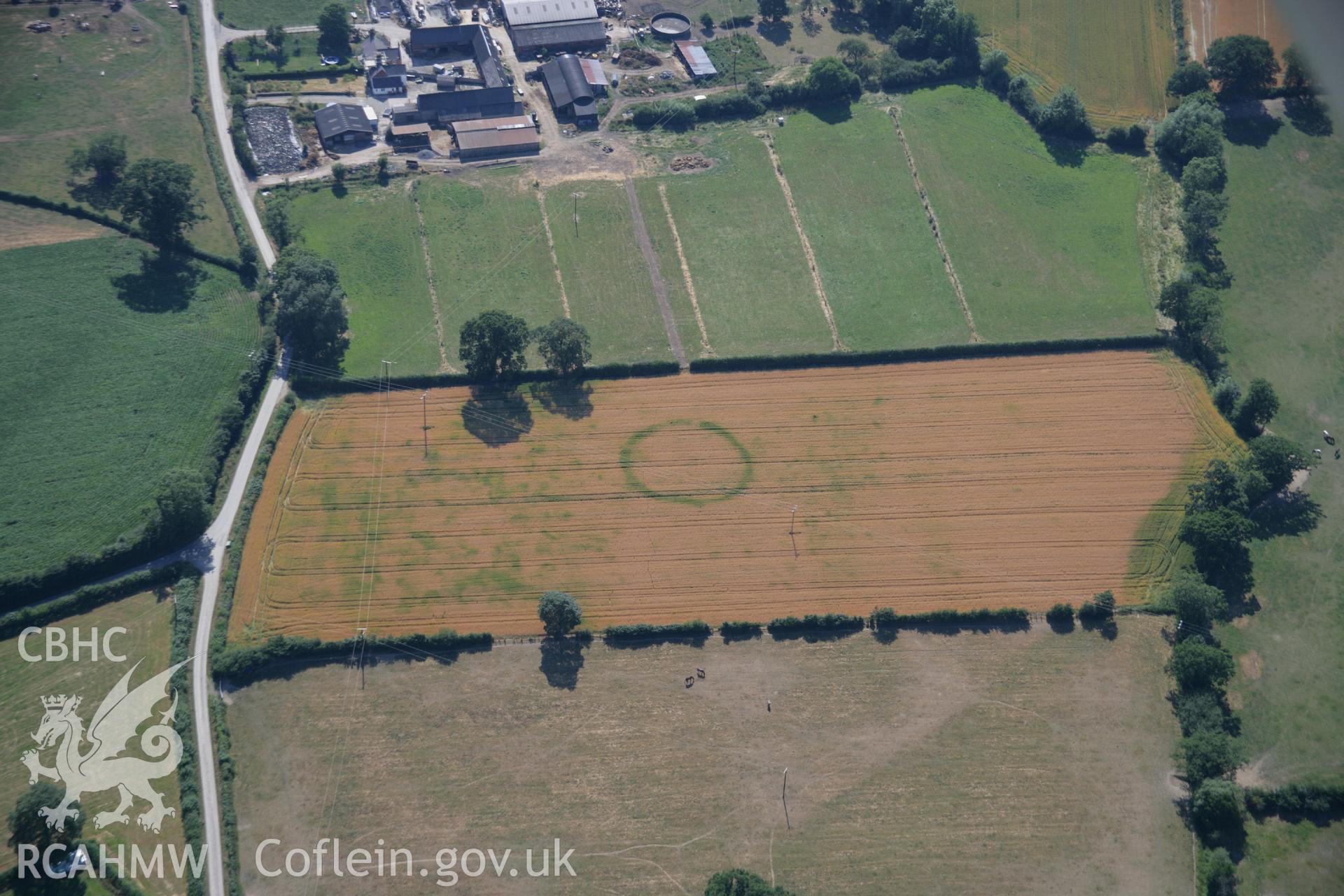 RCAHMW colour oblique aerial photograph of Four Crosses Barrow Cemetery, Site 7. Taken on 17 July 2006 by Toby Driver