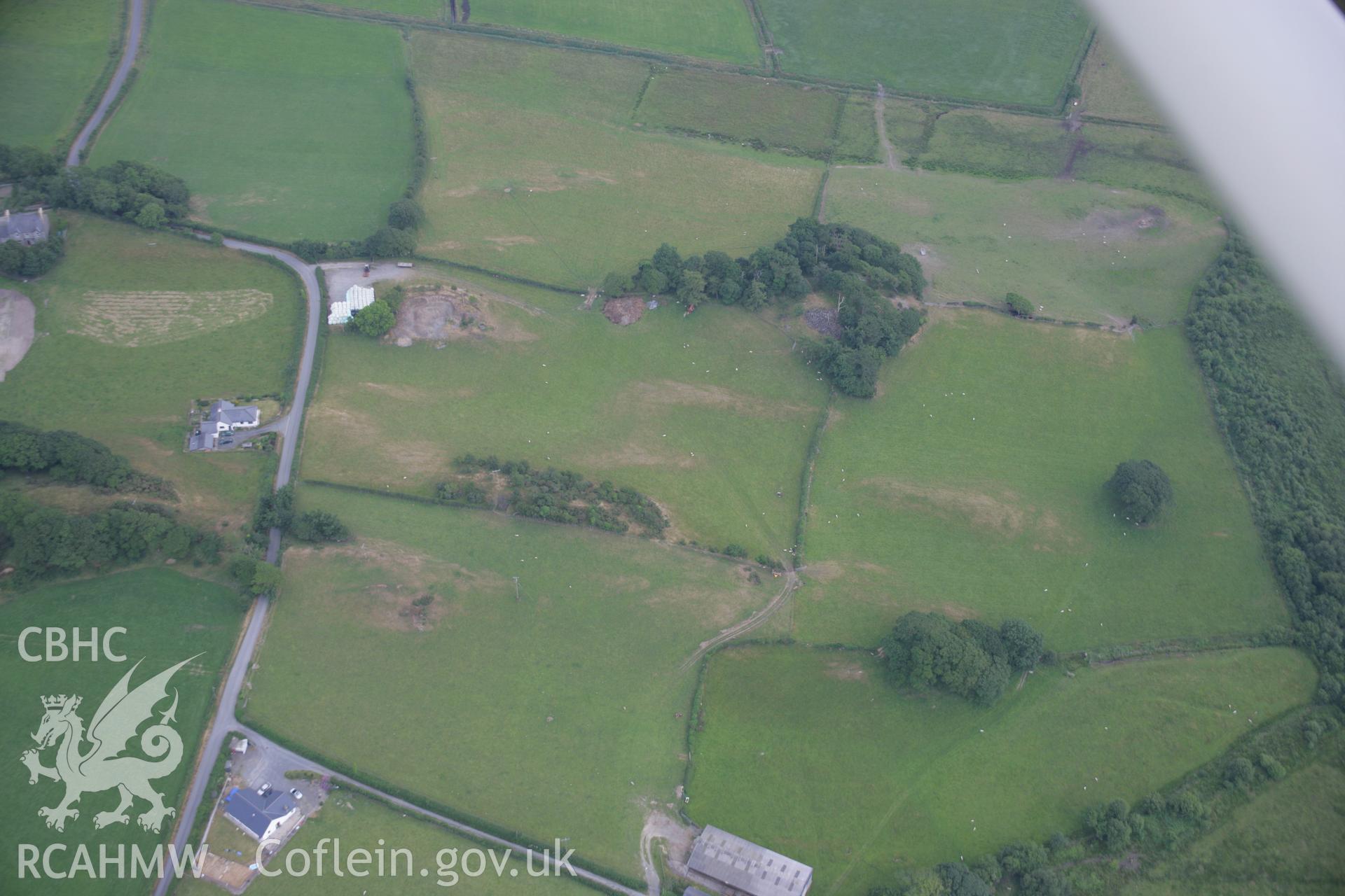 RCAHMW colour oblique aerial photograph of Llancynfelin Island parchmarks Taken on 04 July 2006 by Toby Driver.