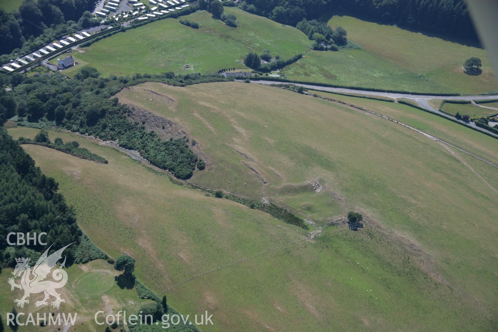 RCAHMW colour oblique aerial photograph of Pen'r-Allt Hillfort, Llanidloes. Taken on 17 July 2006 by Toby Driver.