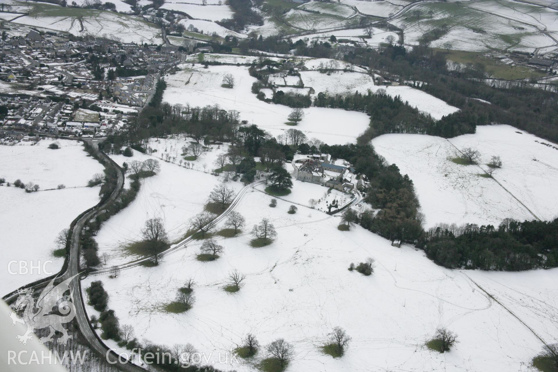 RCAHMW colour oblique aerial photograph of Garn Garden, Henllan, looking south-west. Taken on 06 March 2006 by Toby Driver.