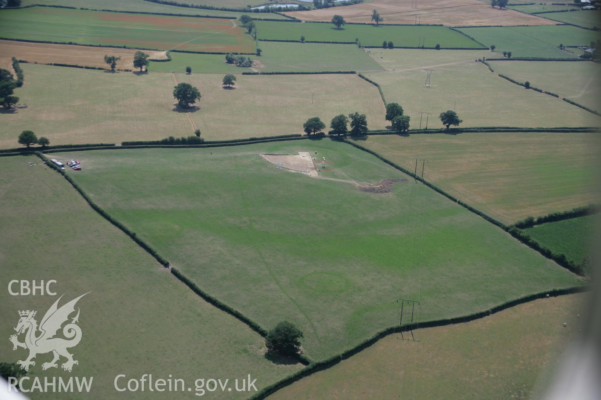 RCAHMW colour oblique aerial photograph of Dyffryn Lane Henge. Taken on 25 July 2006 by Toby Driver.