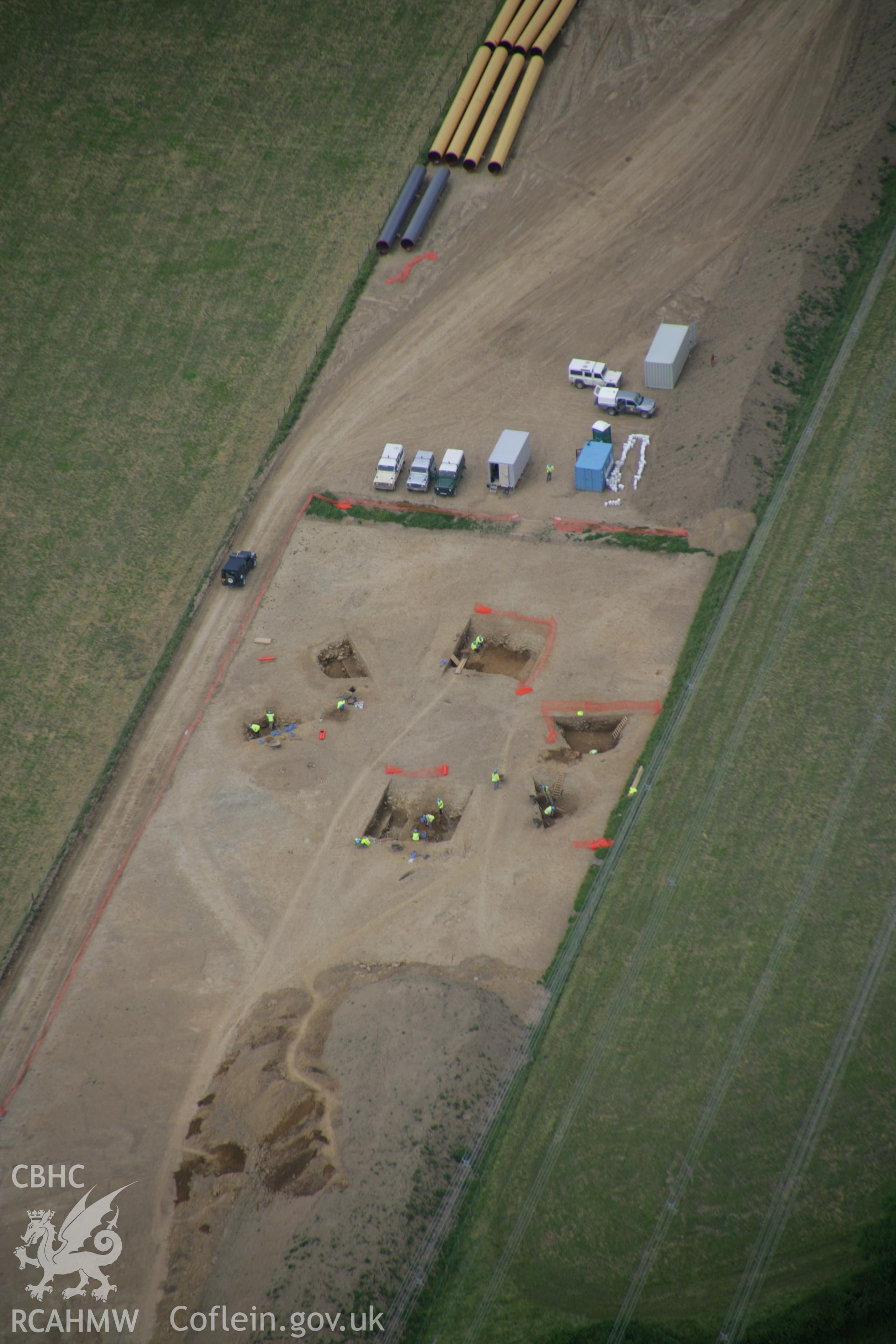 RCAHMW colour oblique aerial photograph of Vaynor Farm Henge showing excavations. Taken on 15 June 2006 by Toby Driver.